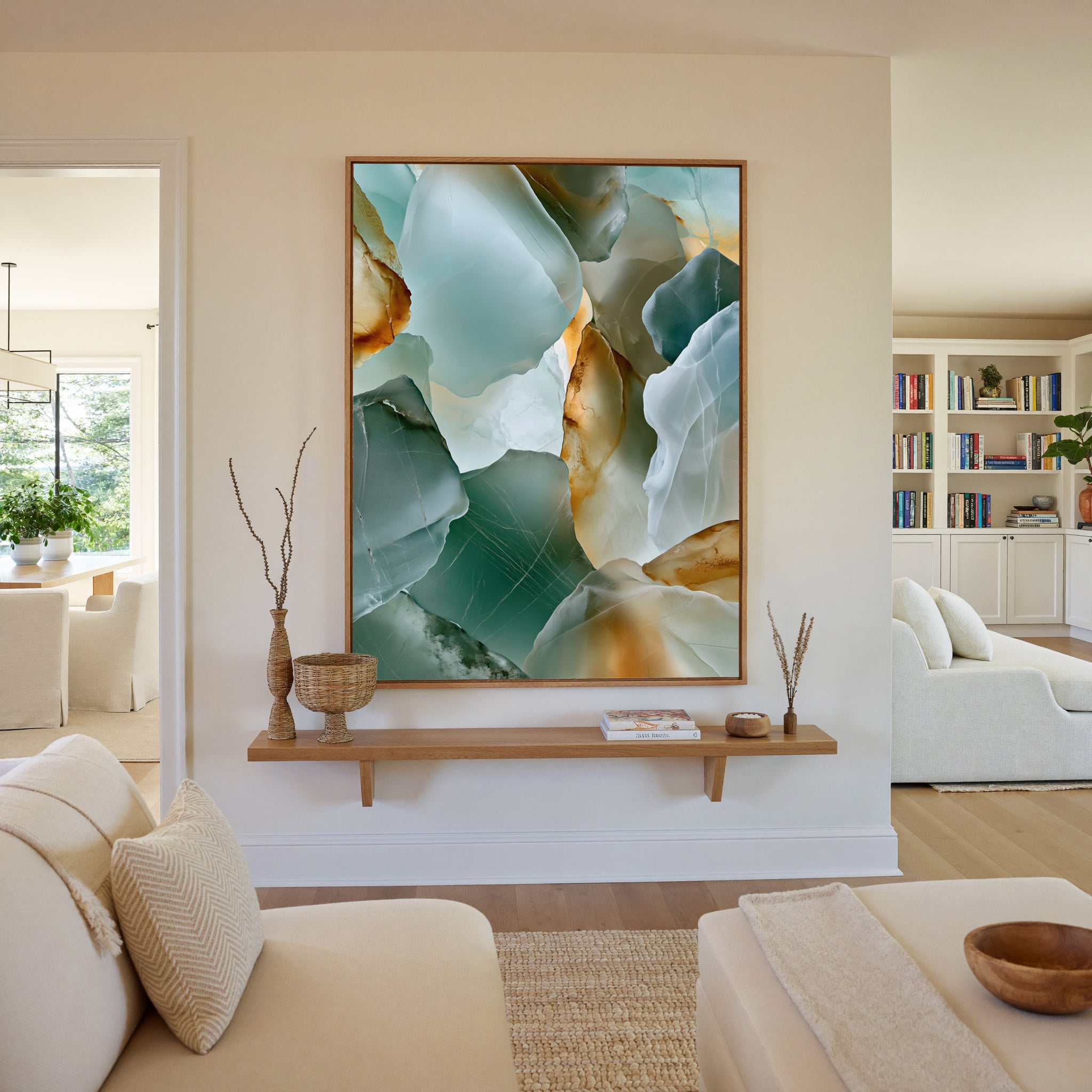 sea glass abstract in aqua, sage, white, and canvas wall art in an oak frame in a living room