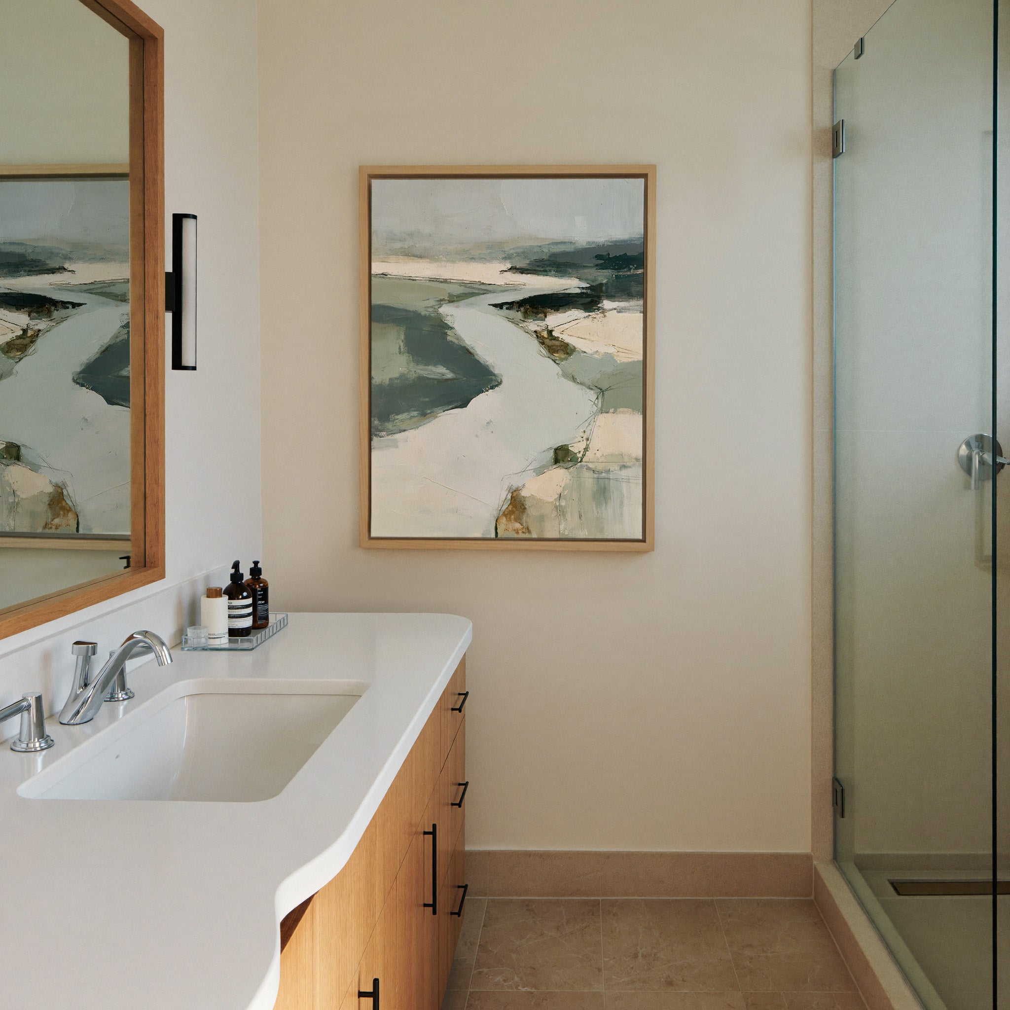 broad pale channel with slate green banks canvas wall art in a natural wood frame in a styled room setting
