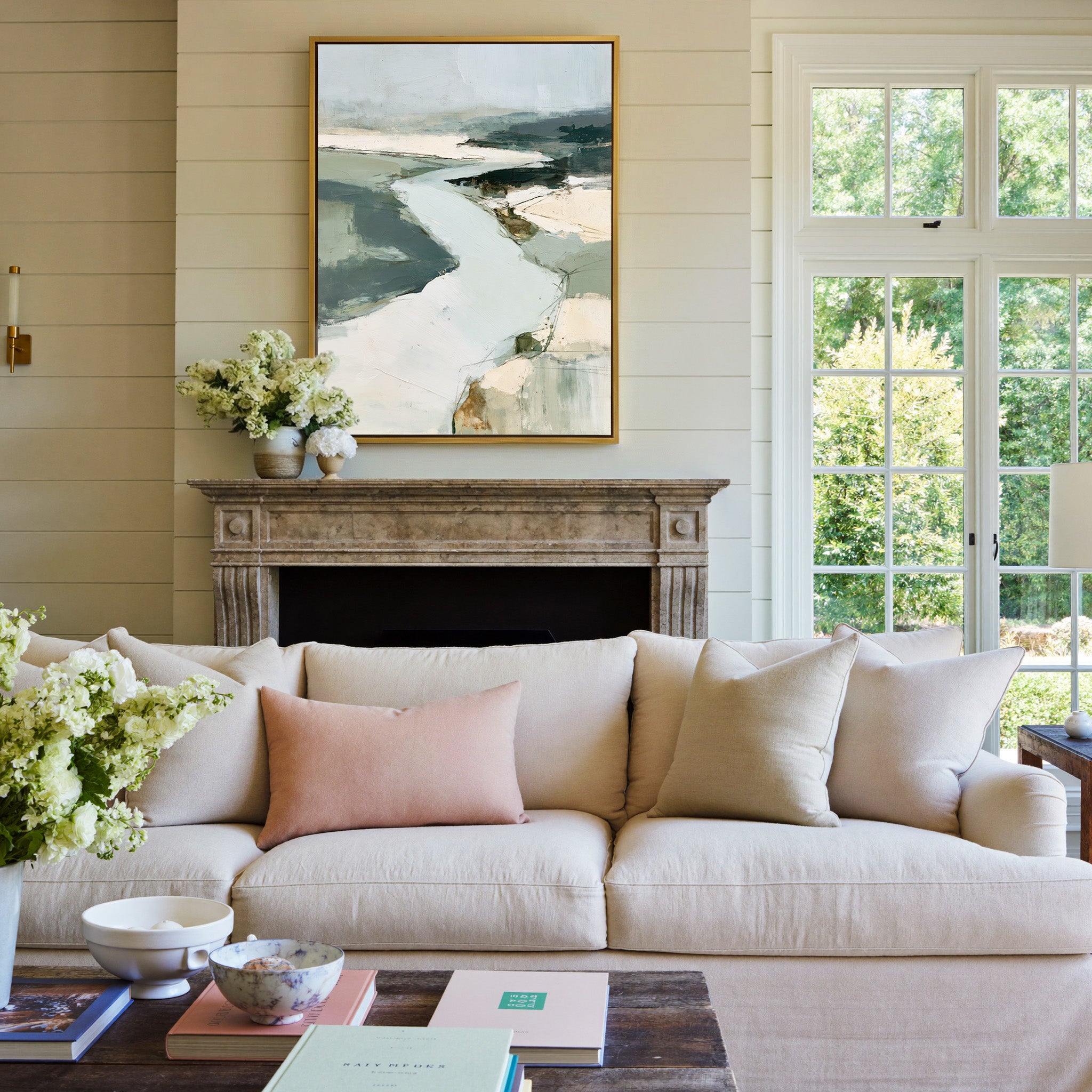 broad pale channel with slate green banks canvas wall art in a gold frame above a mantel