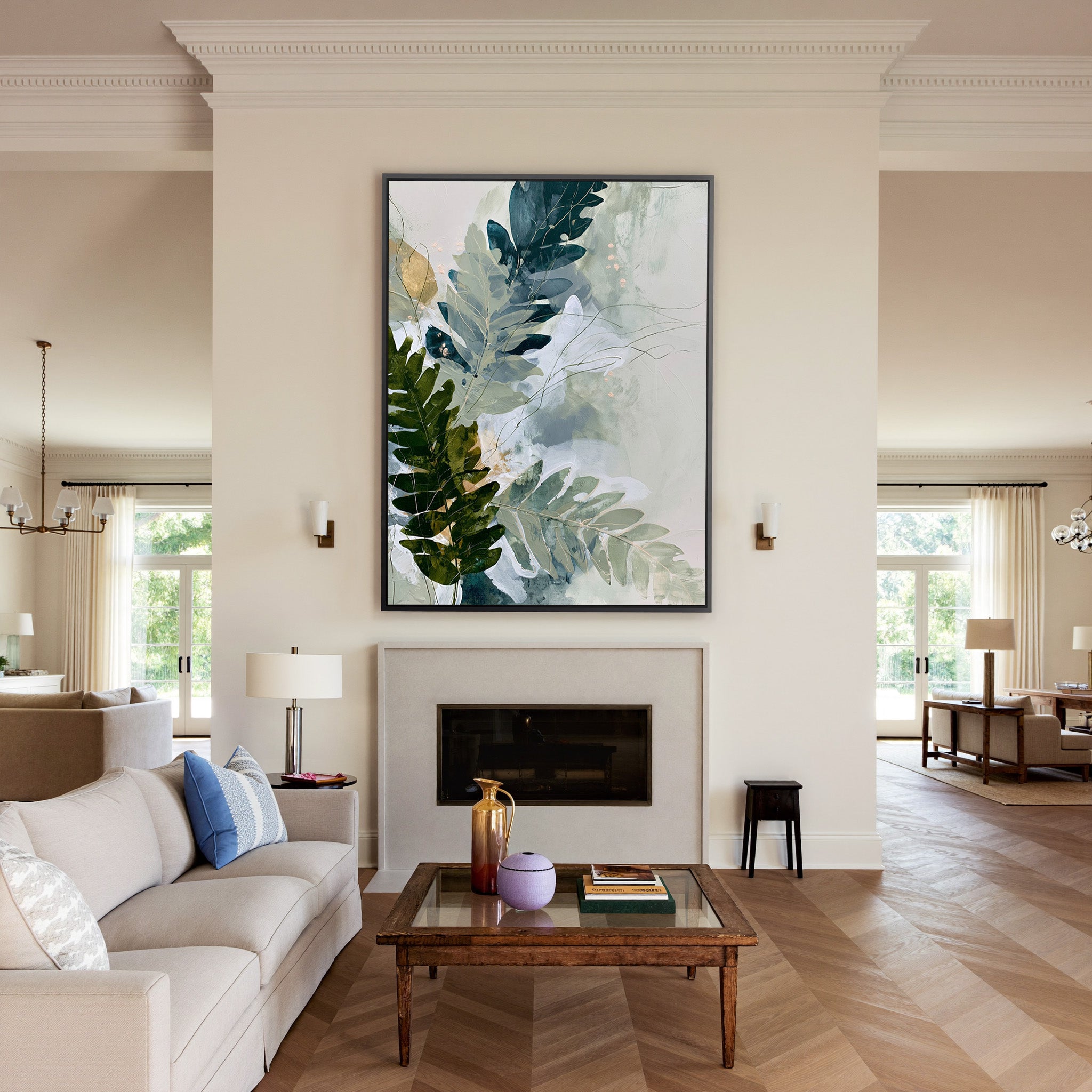 layered fern leaves in sage, moss, slate blue, canvas wall art in a black frame above a mantel
