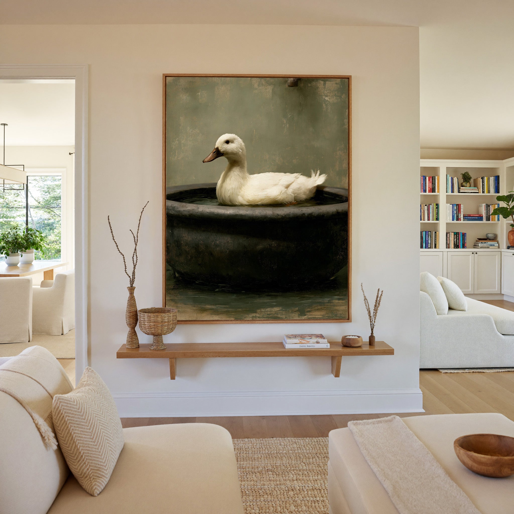 small white duck in a dark basin canvas wall art in an oak frame in a living room