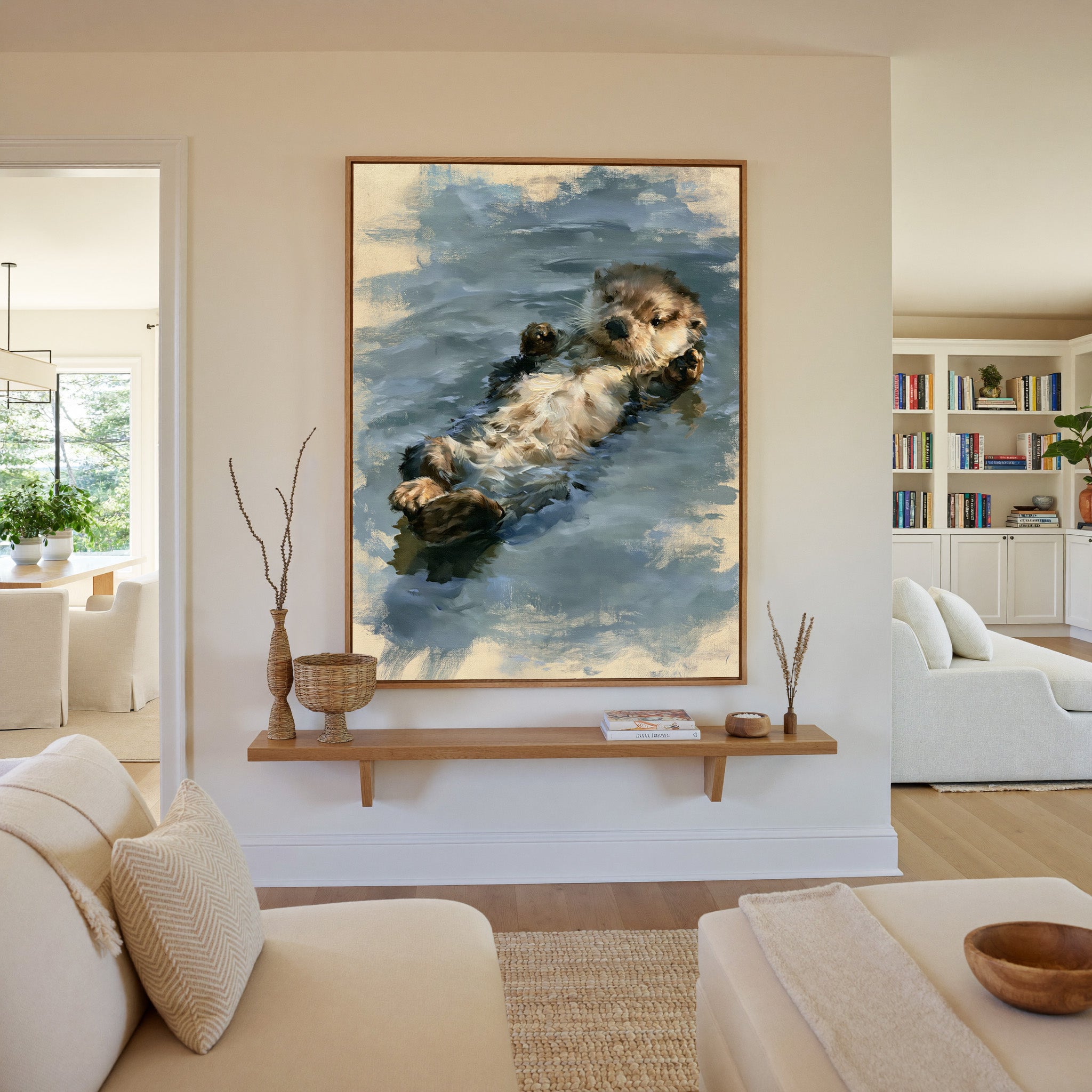 small otter floating on its back in soft grey canvas wall art in an oak frame in a living room