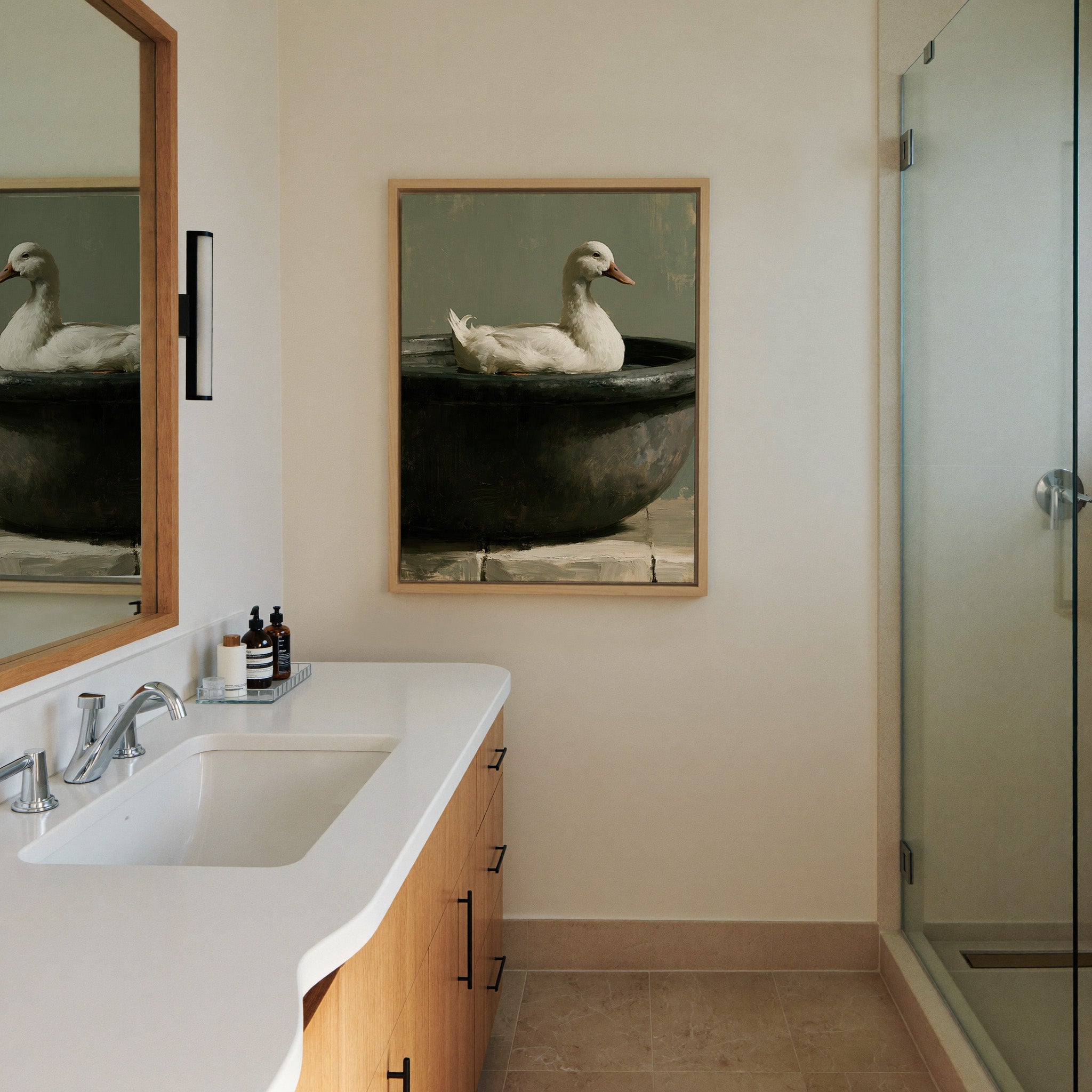 white duck in a dark round basin canvas wall art in a natural wood frame in a styled room setting