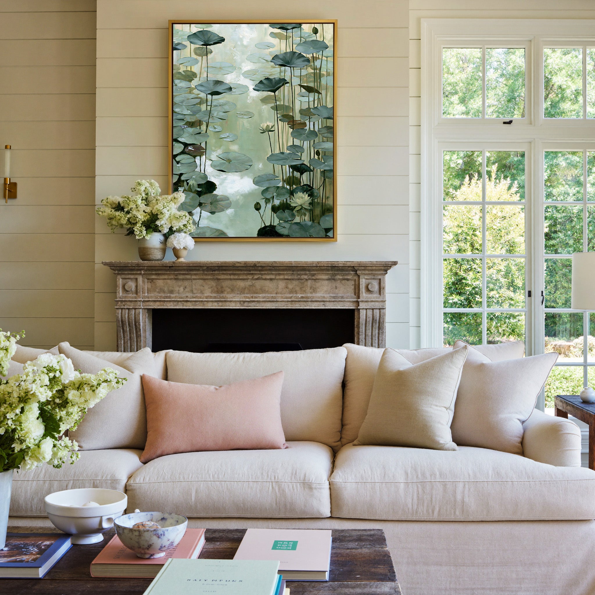 pale green water garden with floating lily pads canvas wall art in a gold frame above a mantel
