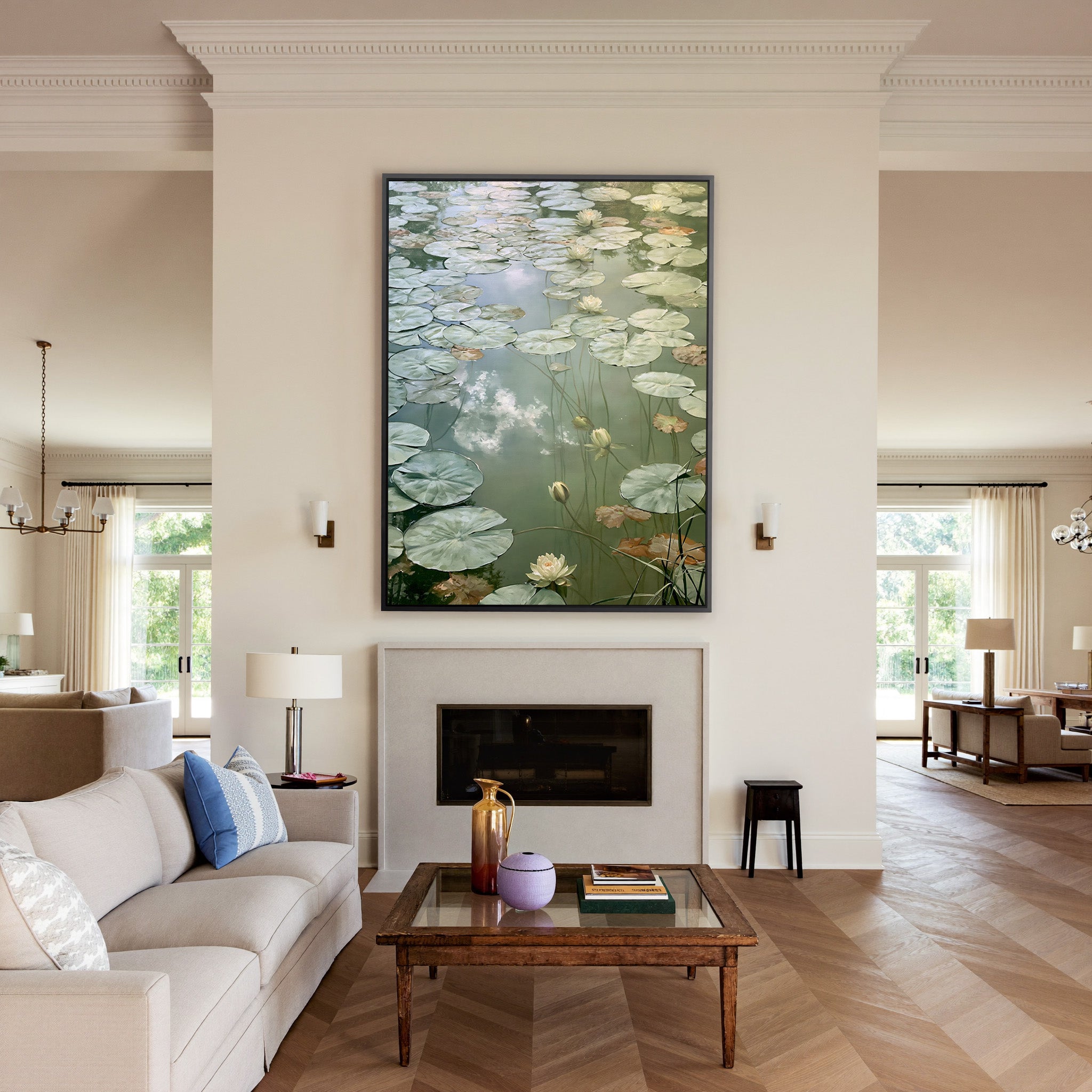 pale lily pads and white blossoms canvas wall art in a black frame above a mantel
