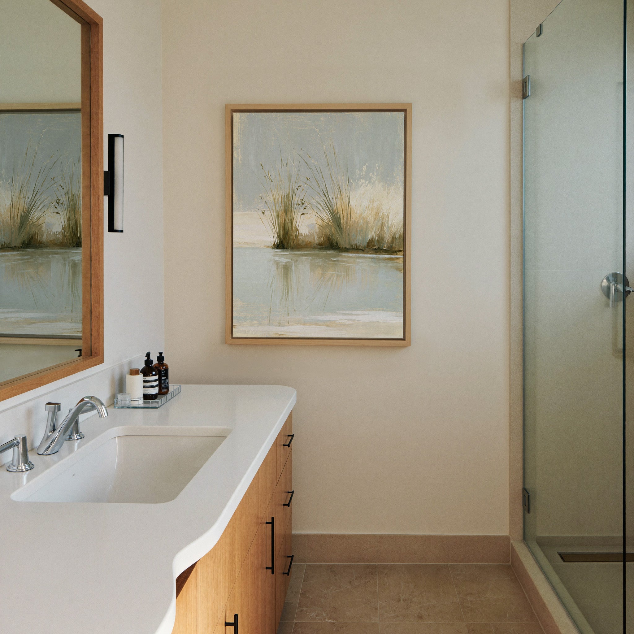 pale reeds and grasses by still water canvas wall art in a natural wood frame in a styled room setting