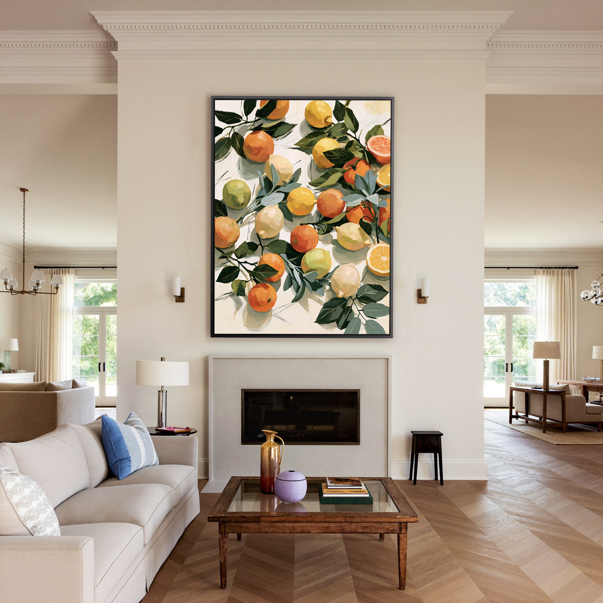 loose citrus still life with dark green leaves canvas wall art in a black frame above a mantel
