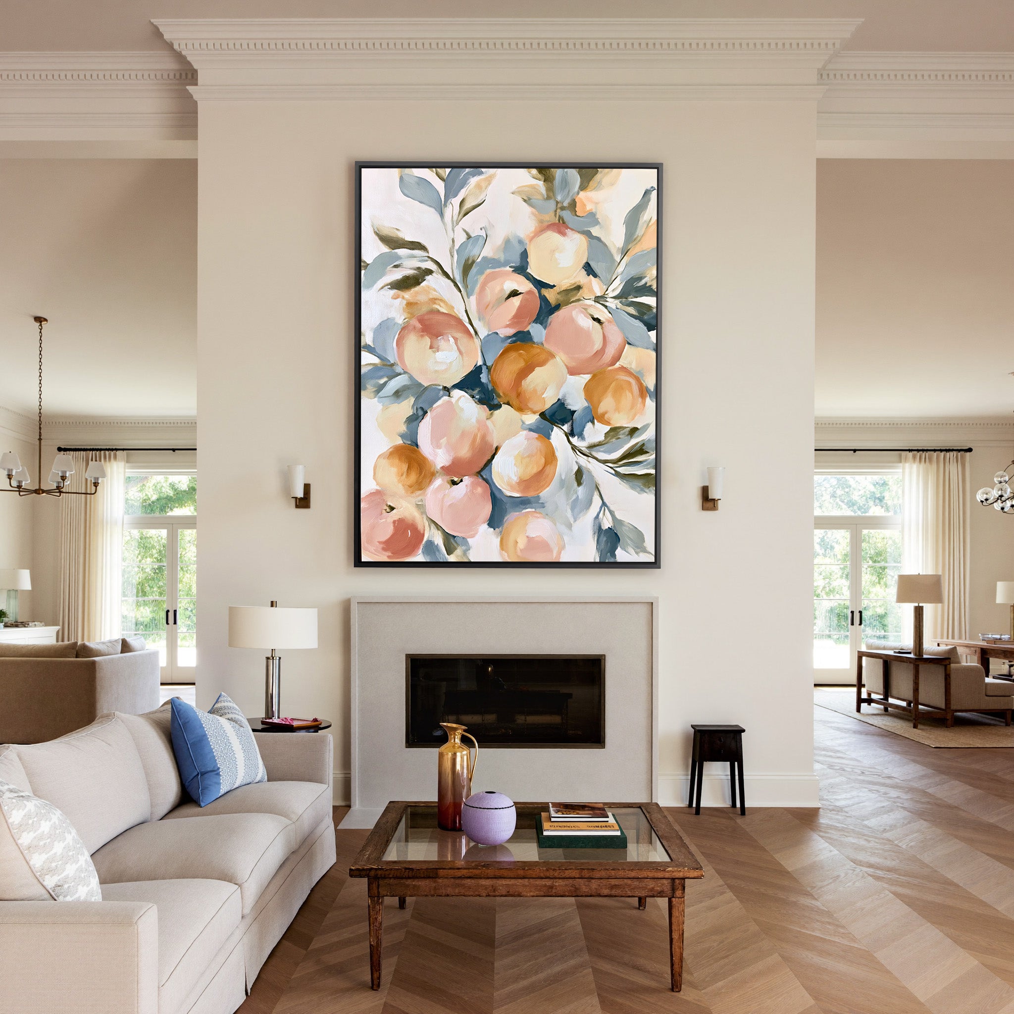 soft peaches and apricots with blue green leaves canvas wall art in a black frame above a mantel