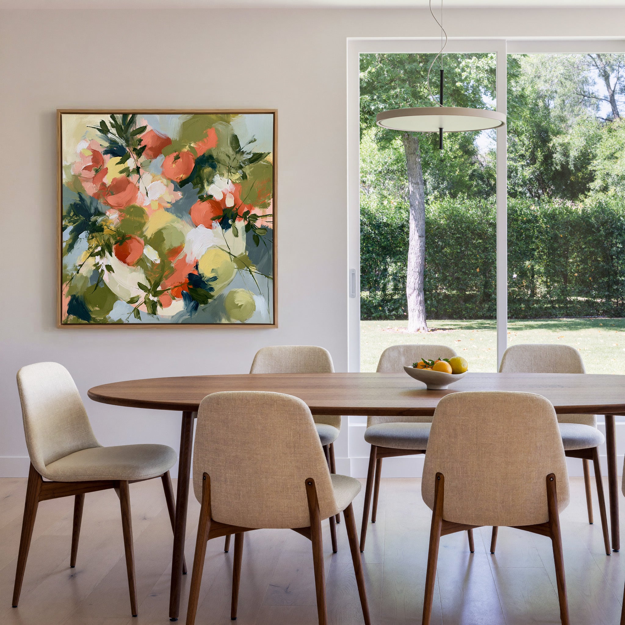 coral tomatoes with green herb leaves canvas wall art in an oak frame in a dining room