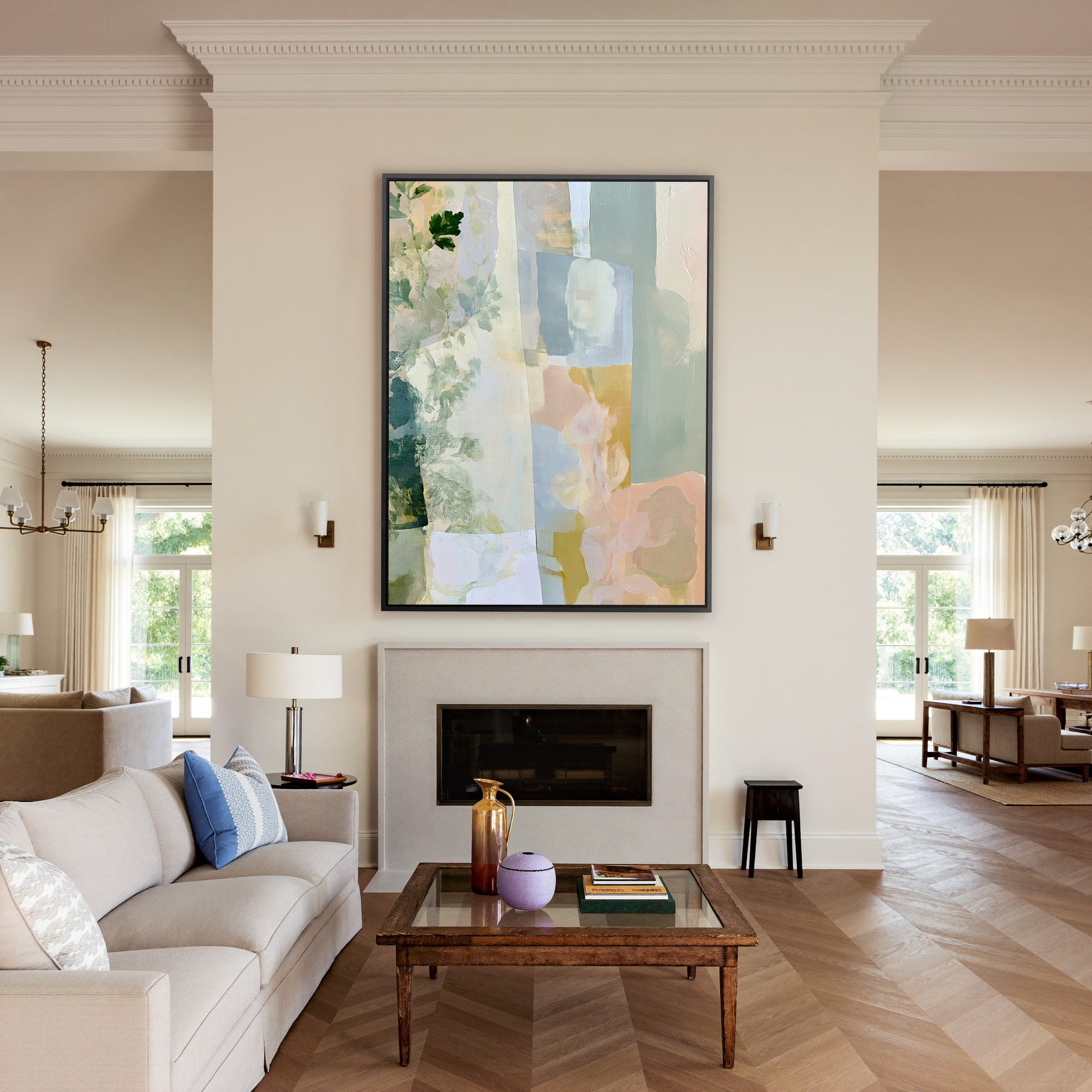 soft linen inspired abstract with sage, blue, canvas wall art in a black frame above a mantel
