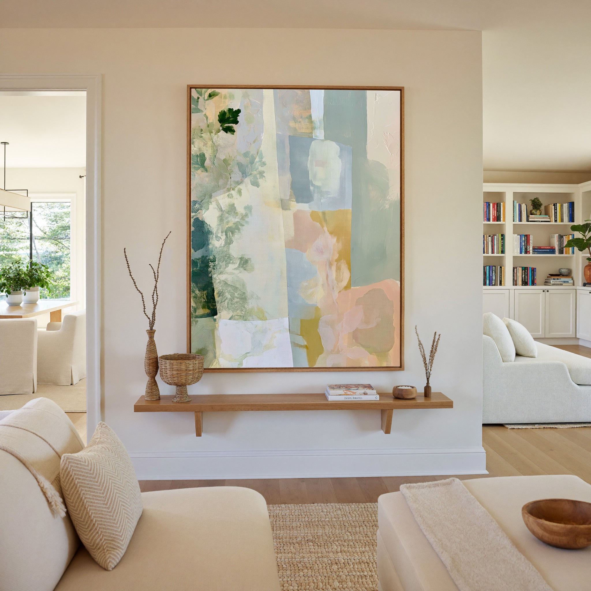 soft linen inspired abstract with sage, blue, canvas wall art in an oak frame in a living room
