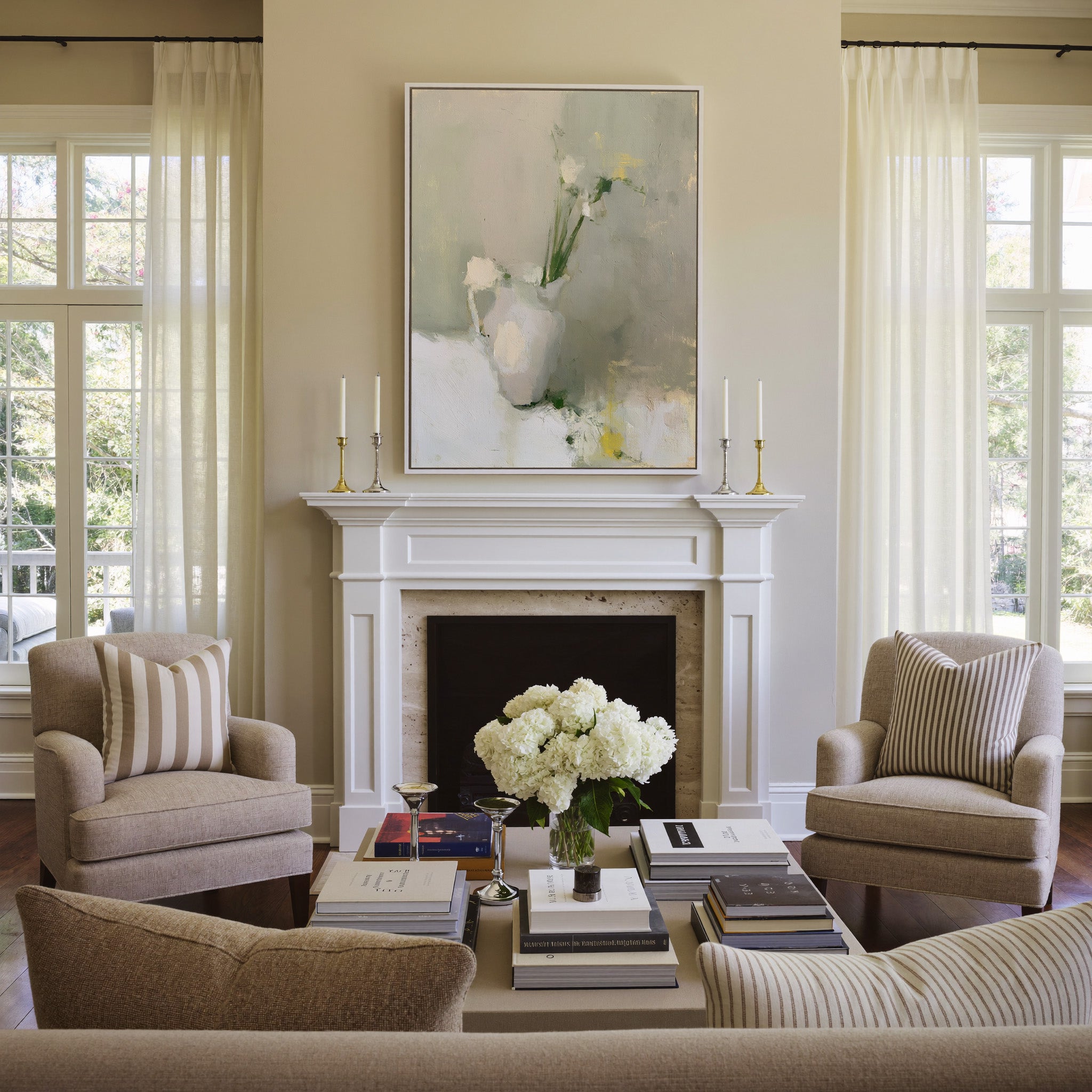 soft neutral still life with a white pitcher canvas wall art in a white frame above a mantel