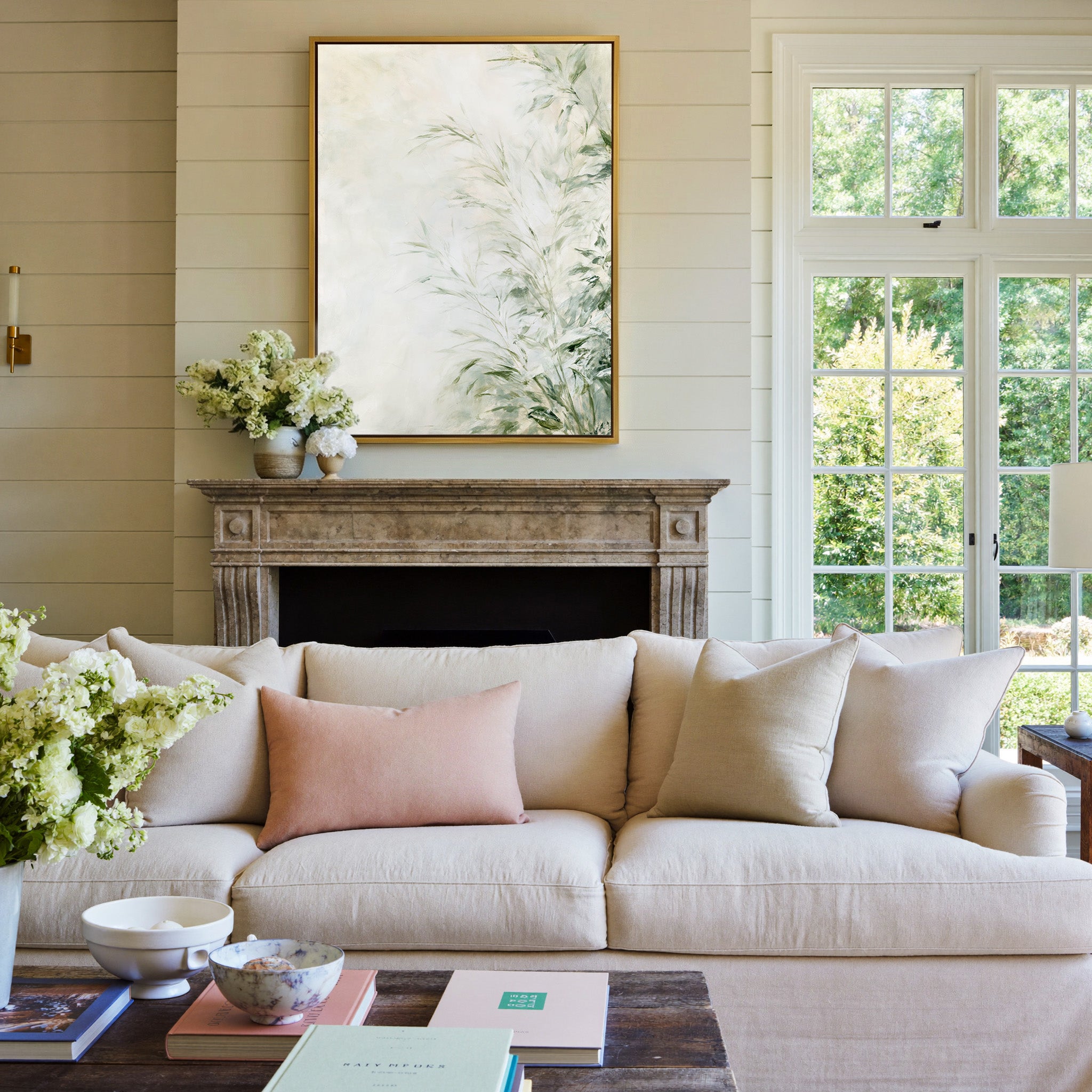 soft sage and cream botanical abstract canvas wall art in a gold frame above a mantel