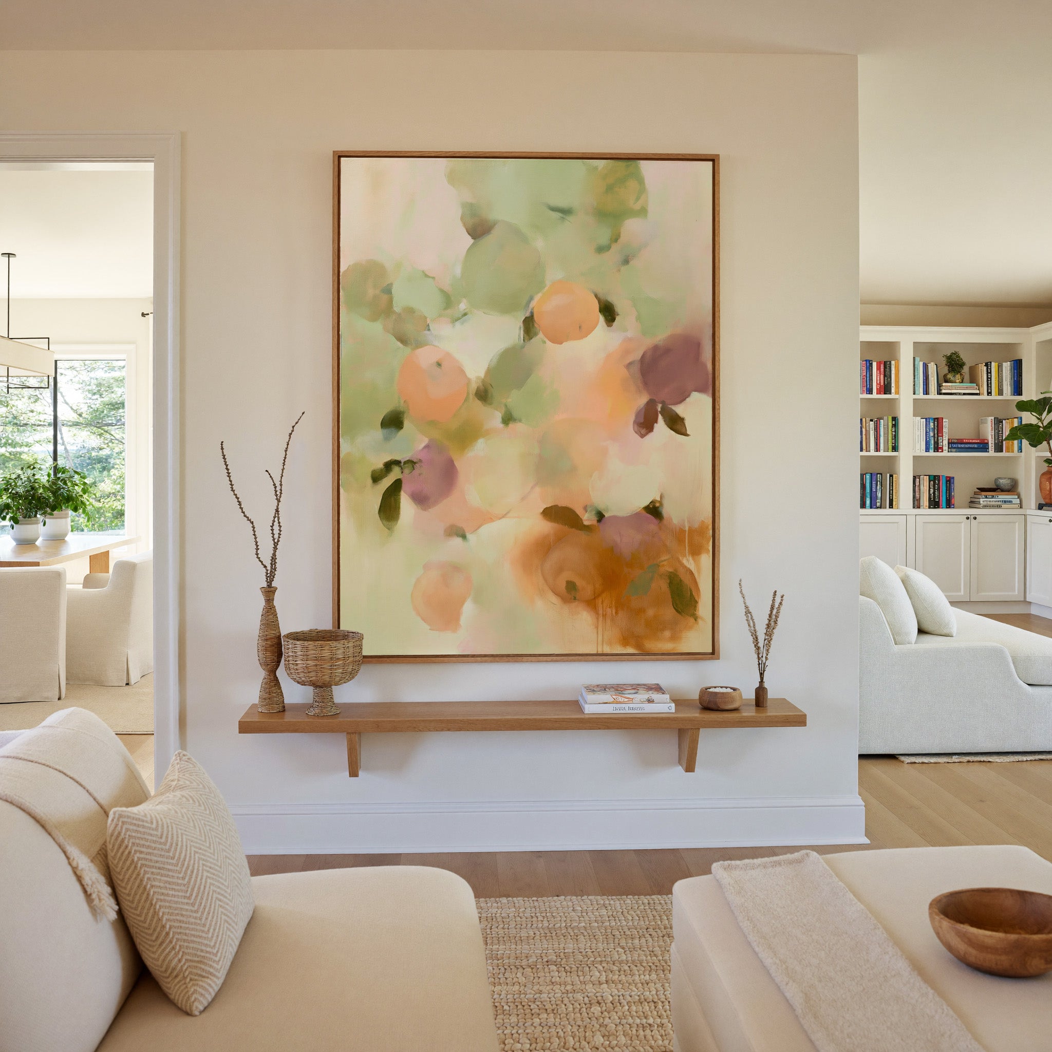 soft orchard toned abstract with pale green, canvas wall art in an oak frame in a living room