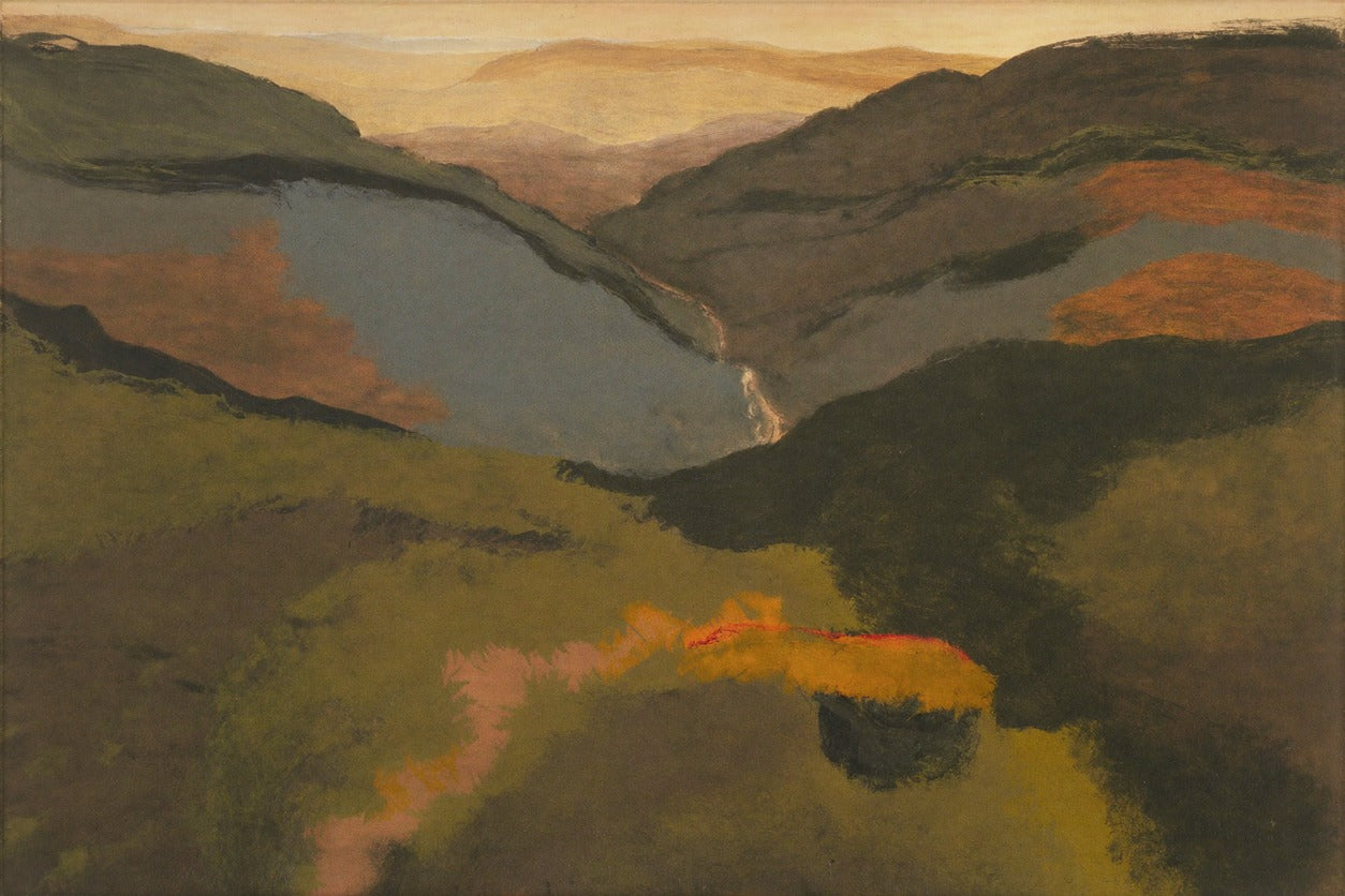 Layered mountain valley at dusk with dark hills, pale center, and warm gold sky