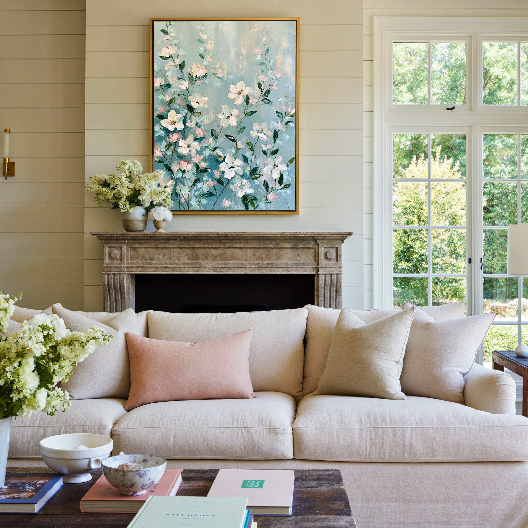 cream, blush, and mint floral garden canvas wall art in a gold frame above a mantel