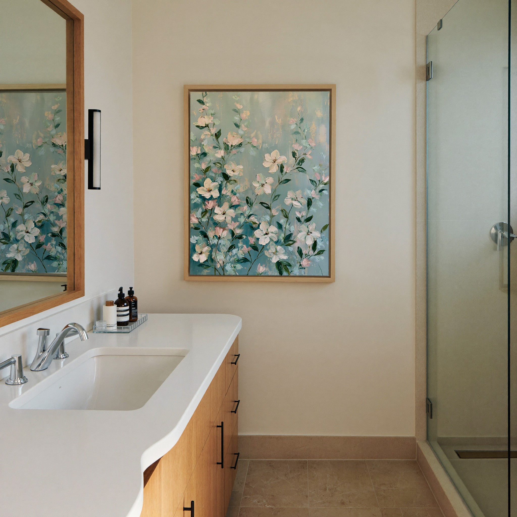 cream, blush, and mint floral garden canvas wall art in a natural wood frame in a styled room setting