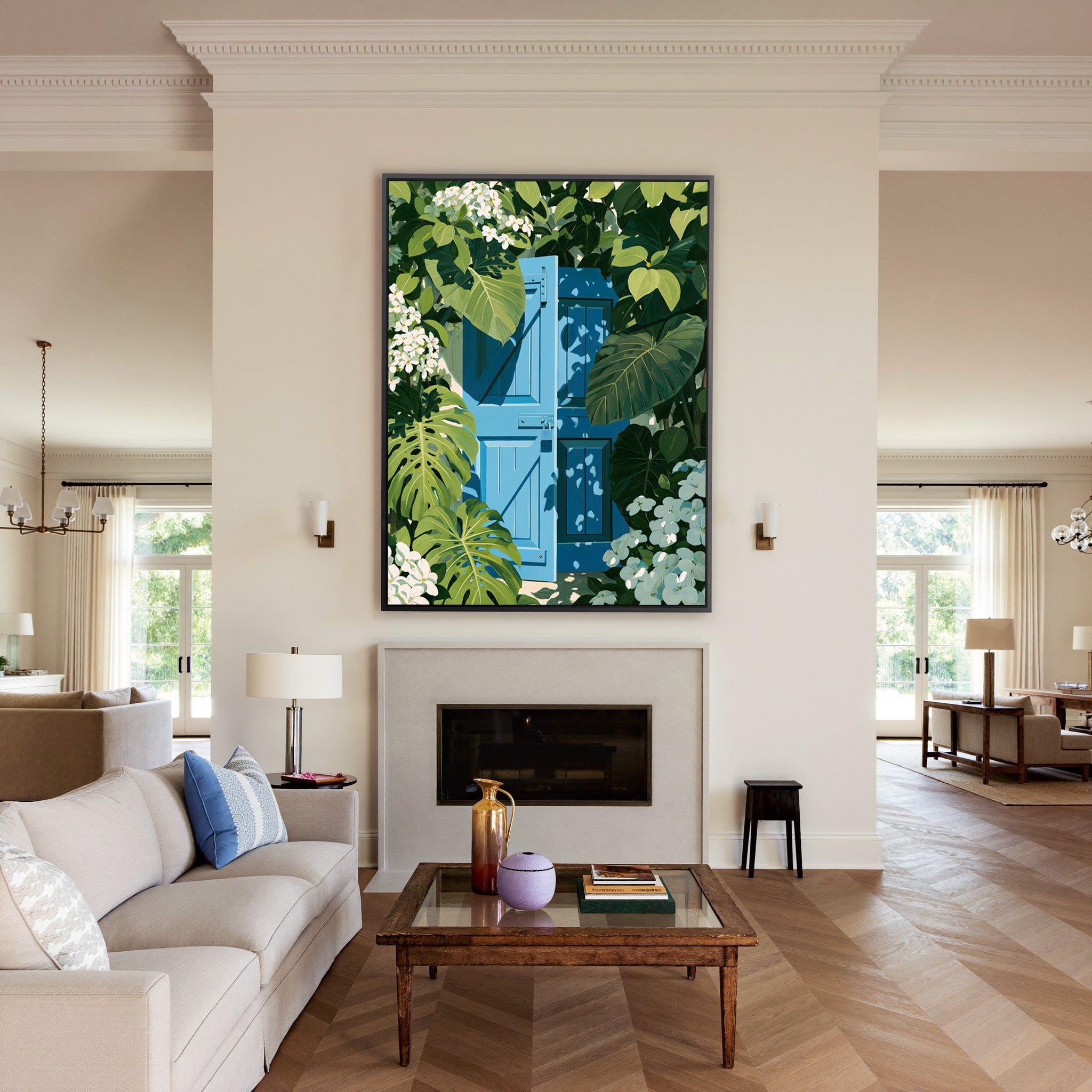 bright blue gate framed by oversized green canvas wall art in a black frame above a mantel