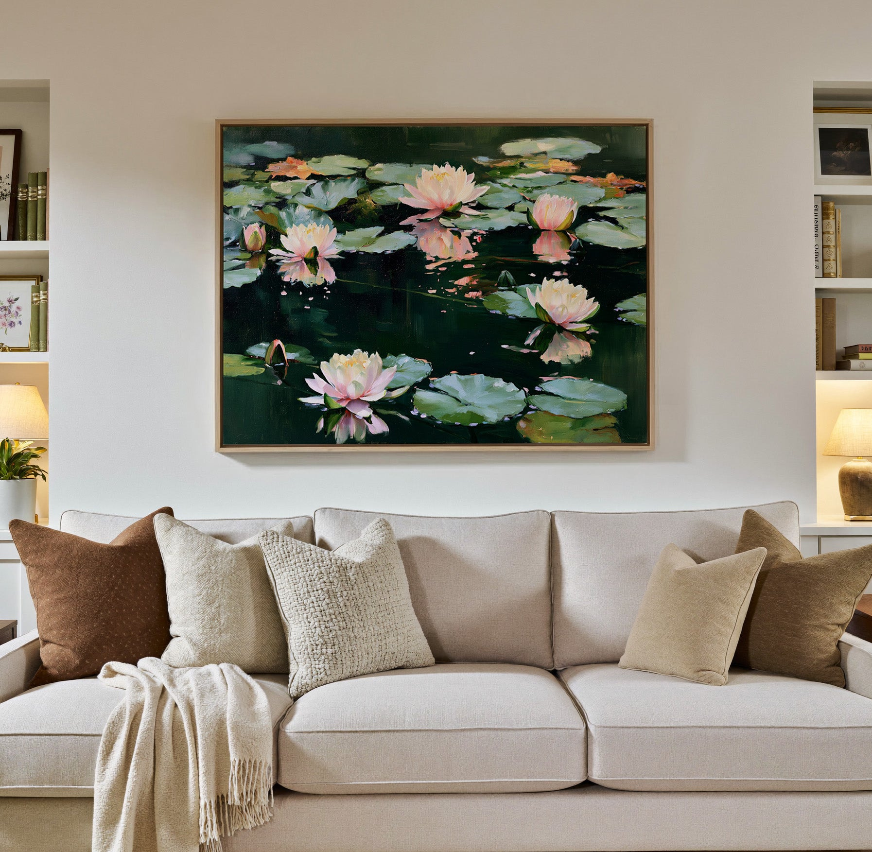pink and white water lilies on canvas wall art in a natural wood frame in a styled room setting