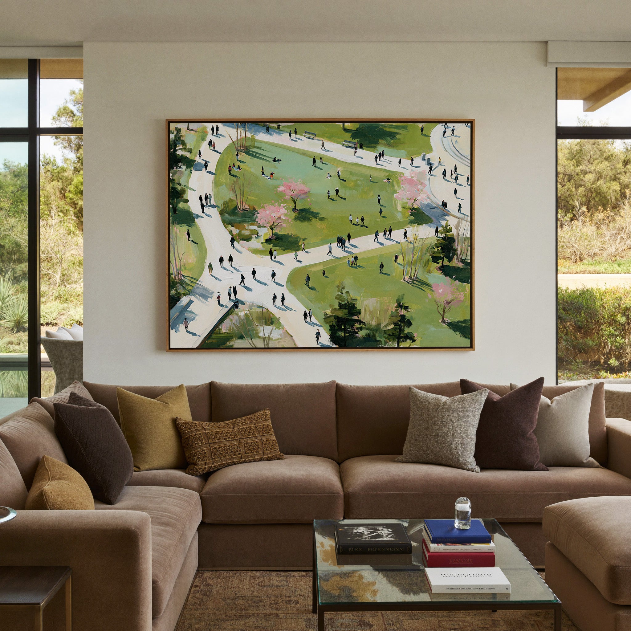 green park with winding paths and scattered canvas wall art in an oak frame in a styled room setting