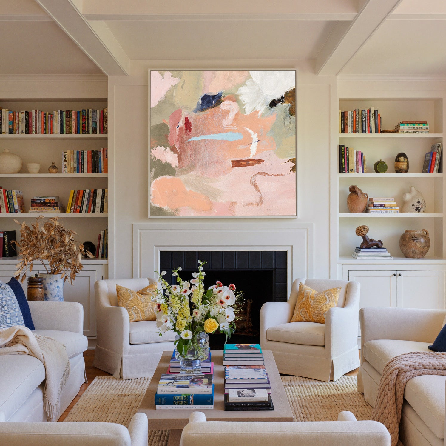 soft peach and blush abstract with cream, sage, canvas wall art in a white frame above a fireplace