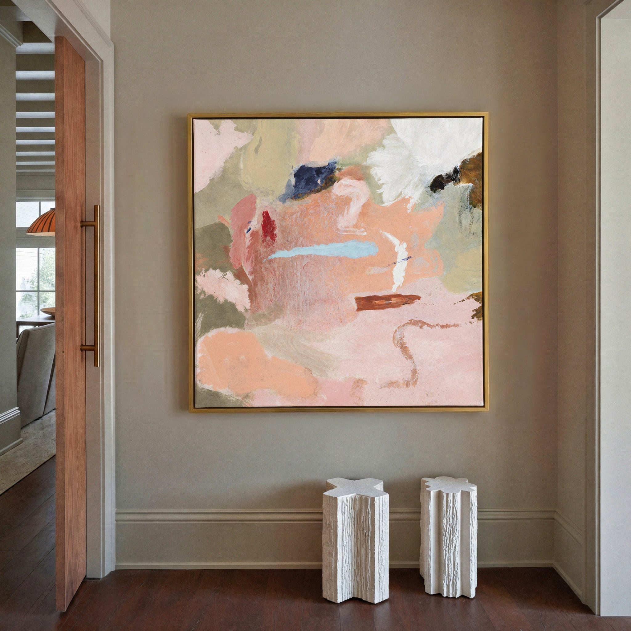 soft peach and blush abstract with cream, sage, canvas wall art in a gold frame in a styled room setting