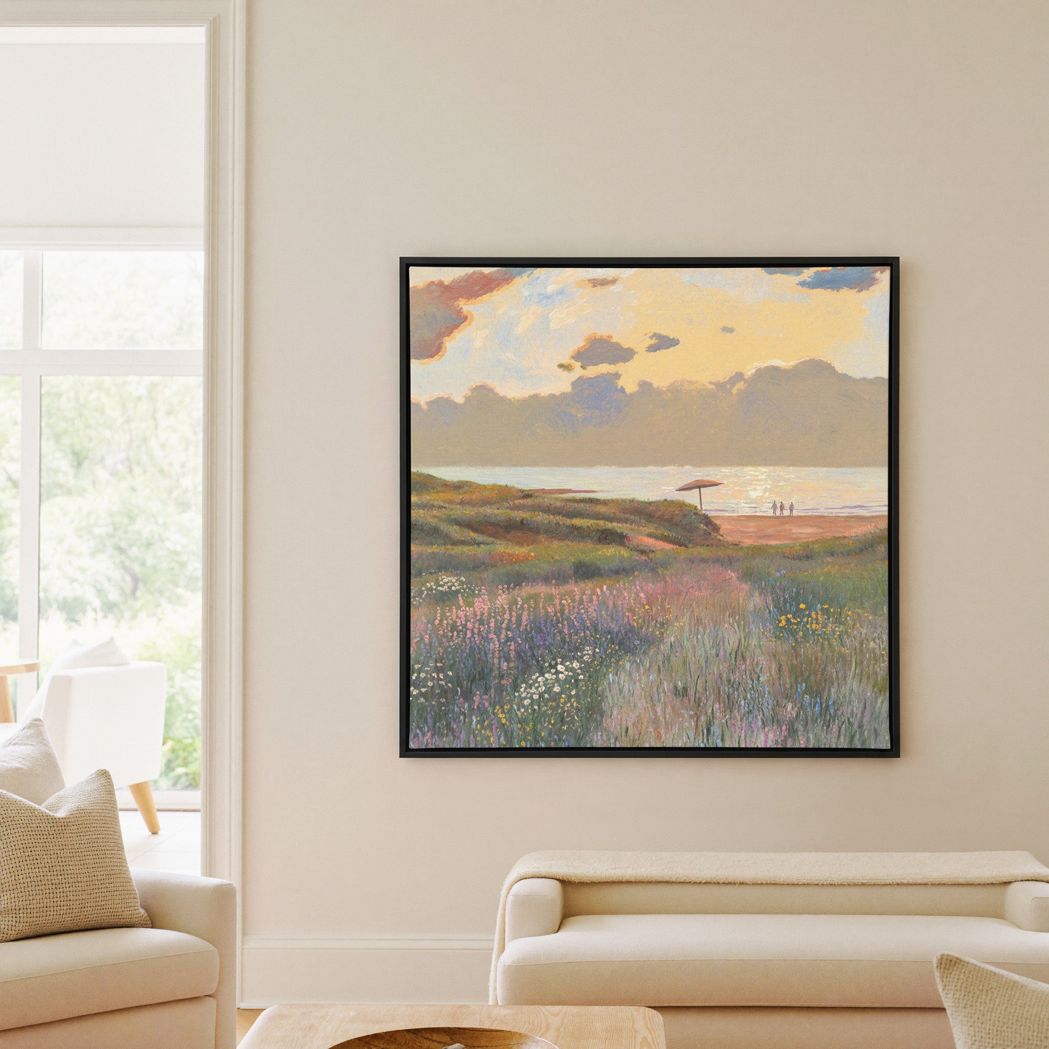 soft coastal meadow with pastel wildflowers and canvas wall art in a black frame in a living room