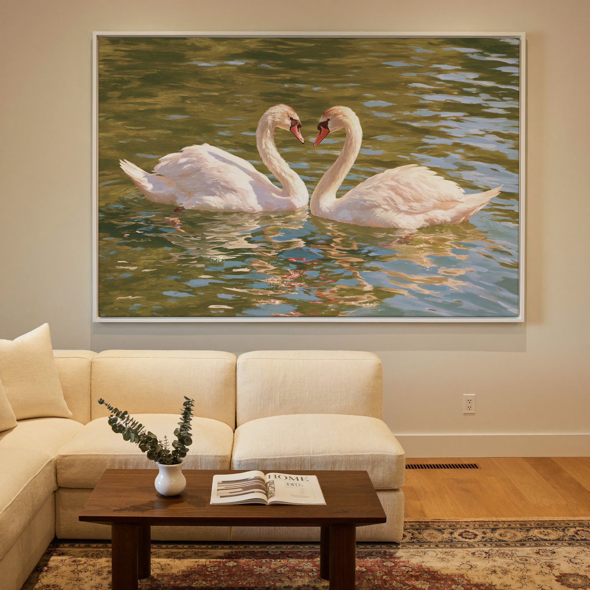two white swans facing each other on green water canvas wall art in a white frame in a styled room setting