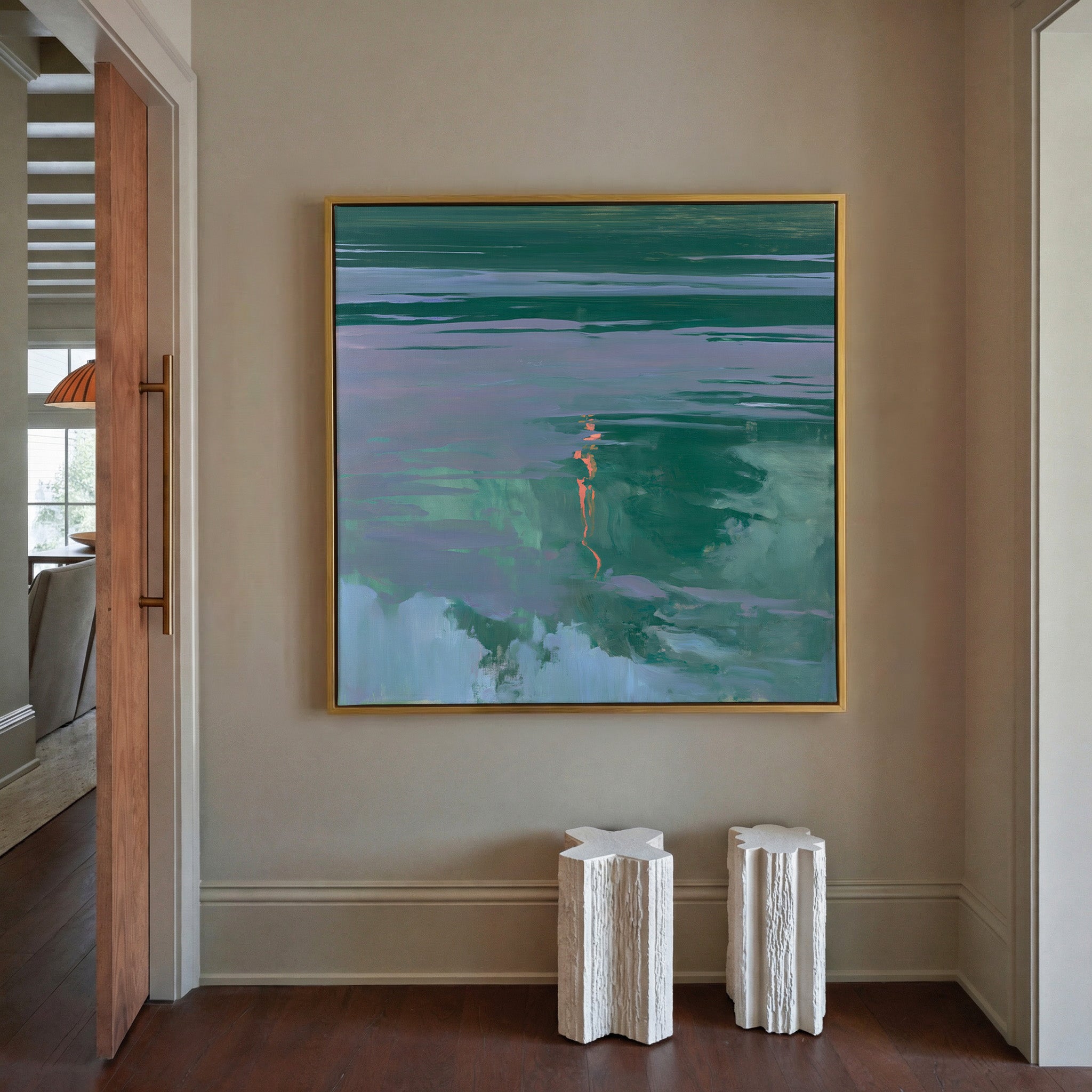 green and lavender abstract with coral canvas wall art in a gold frame in a styled room setting