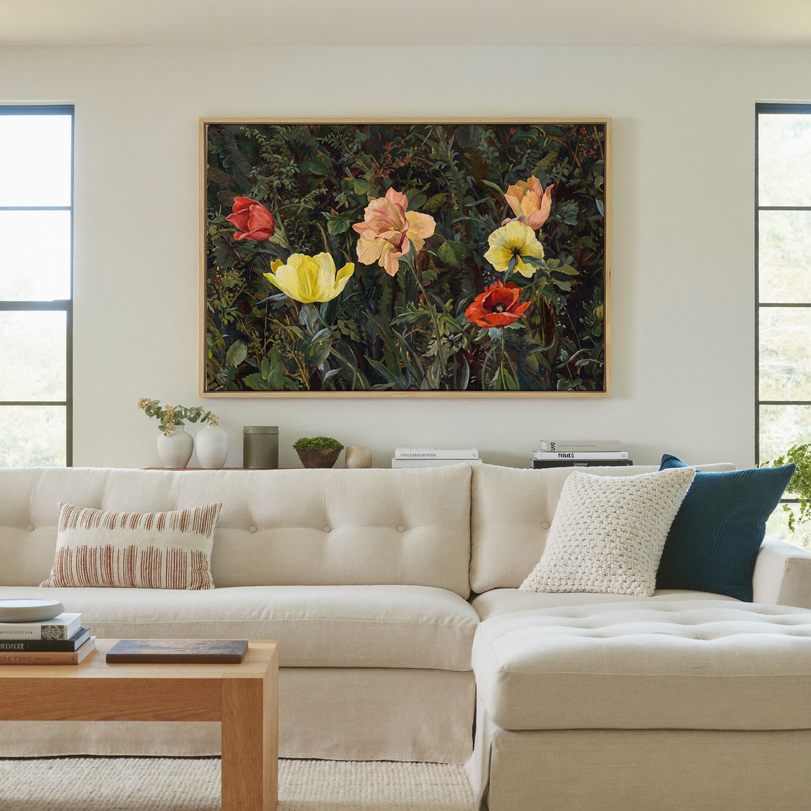 dark foliage with yellow, peach, and red poppies canvas wall art in a natural wood frame in a living room