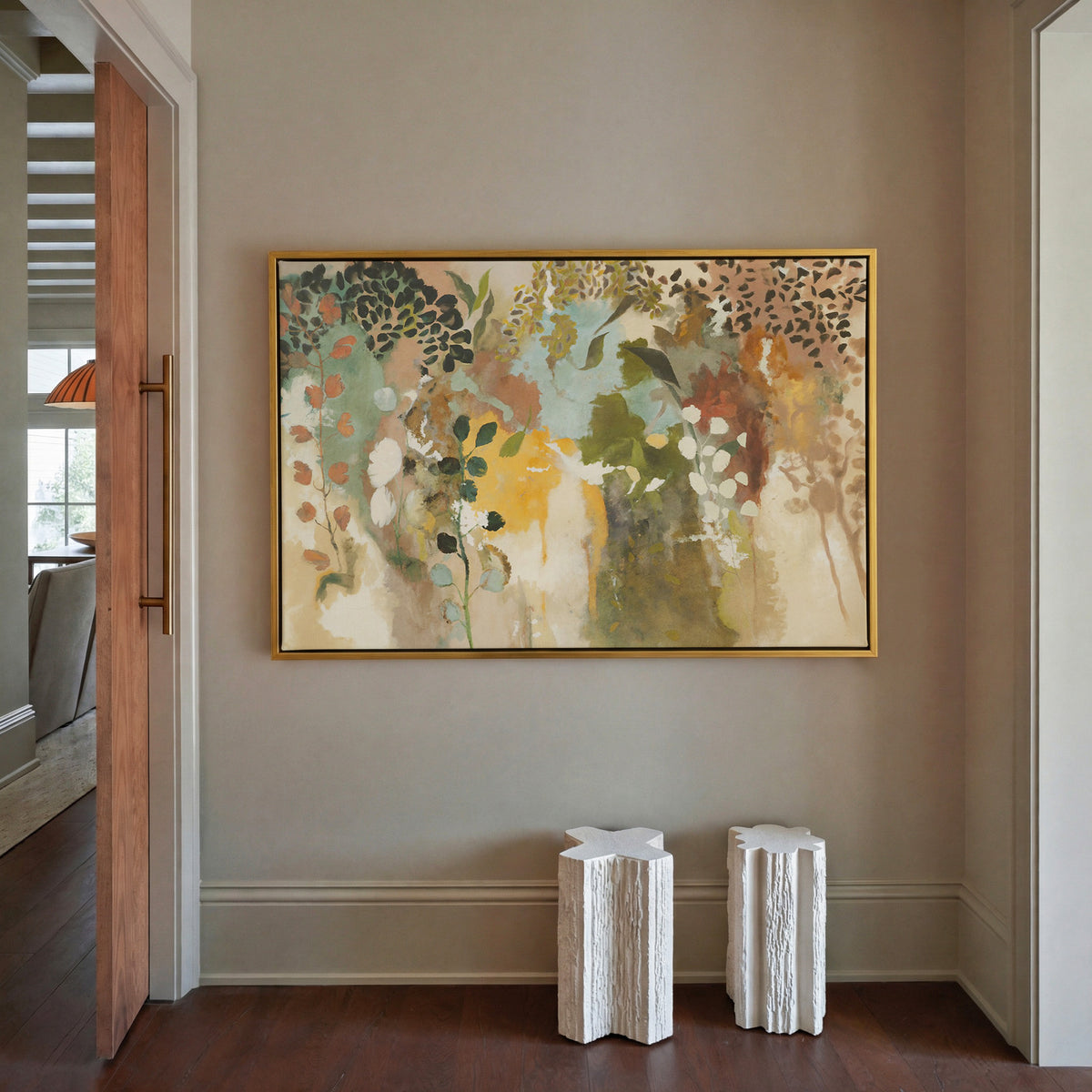 soft botanical abstract with olive, saffron, canvas wall art in a gold frame in a styled room setting