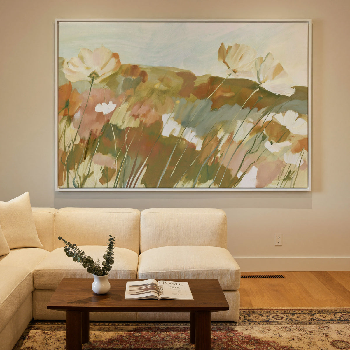 soft apricot poppies in a loose meadow canvas wall art in a white frame in a styled room setting