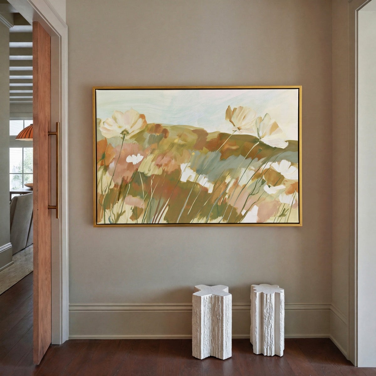 soft apricot poppies in a loose meadow canvas wall art in a gold frame in a styled room setting