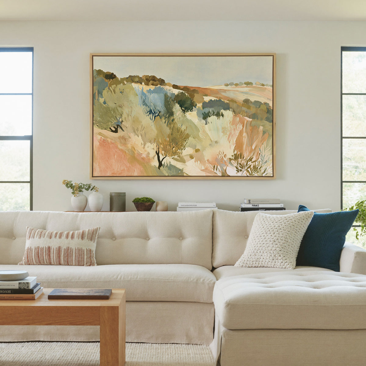 warm hillside olive orchard with pale sky and canvas wall art in a natural wood frame in a living room