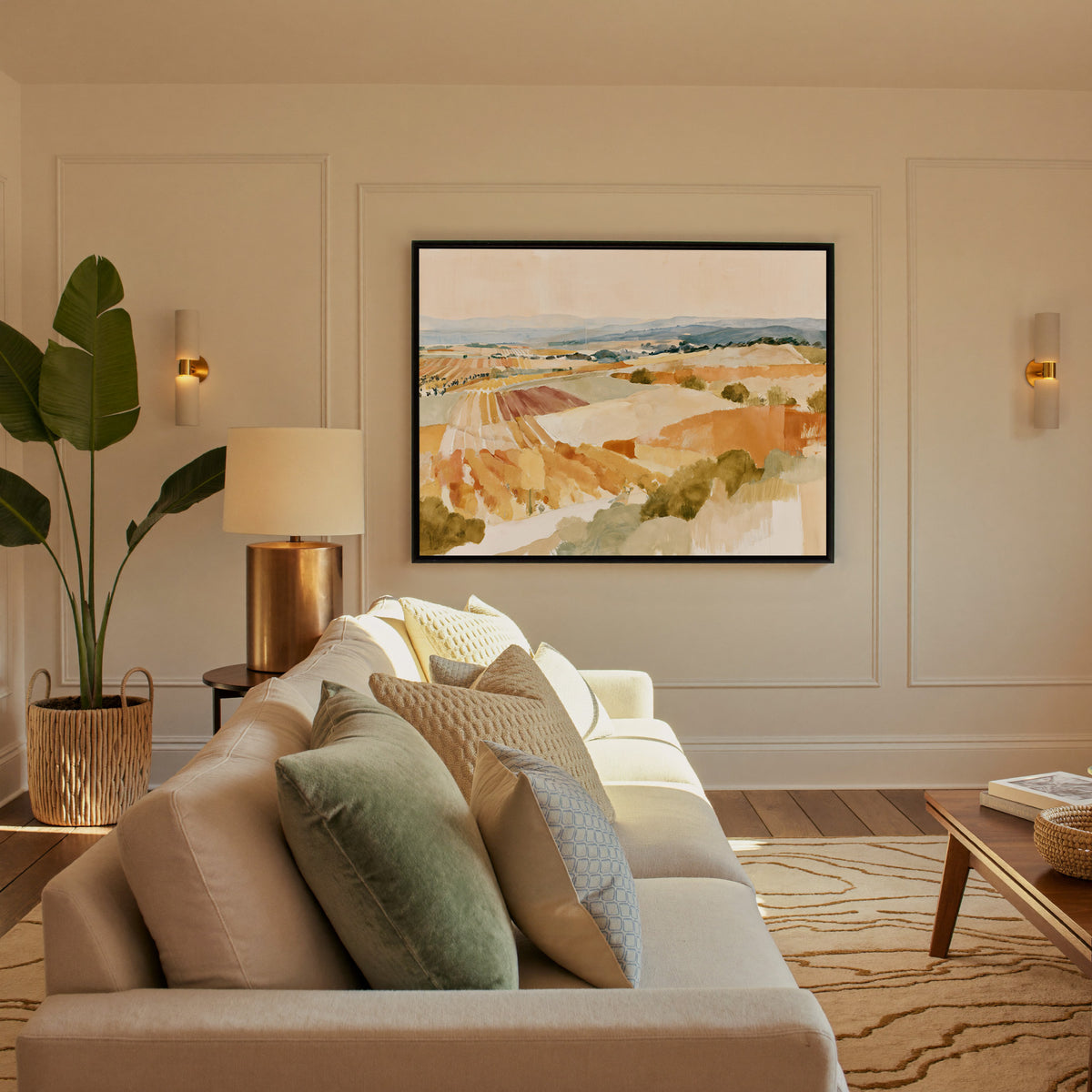 soft vineyard hills in ochre, cream, and blue canvas wall art in a black frame in a styled room setting