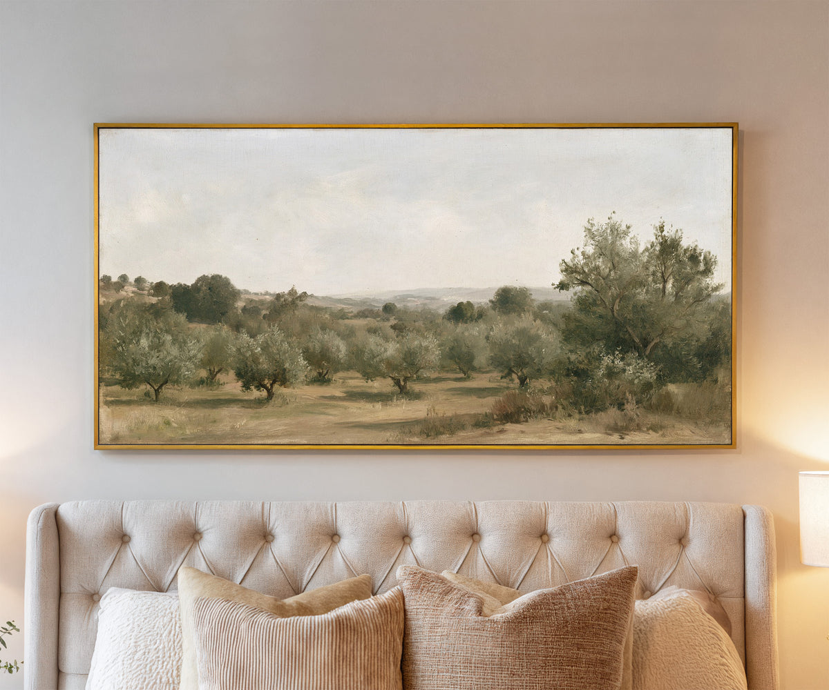 late summer orchard with uneven rows of small canvas wall art in a gold frame above a bed