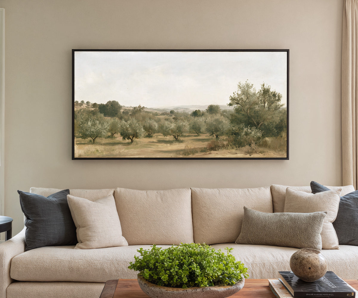 late summer orchard with uneven rows of small canvas wall art in a black frame in a styled room setting