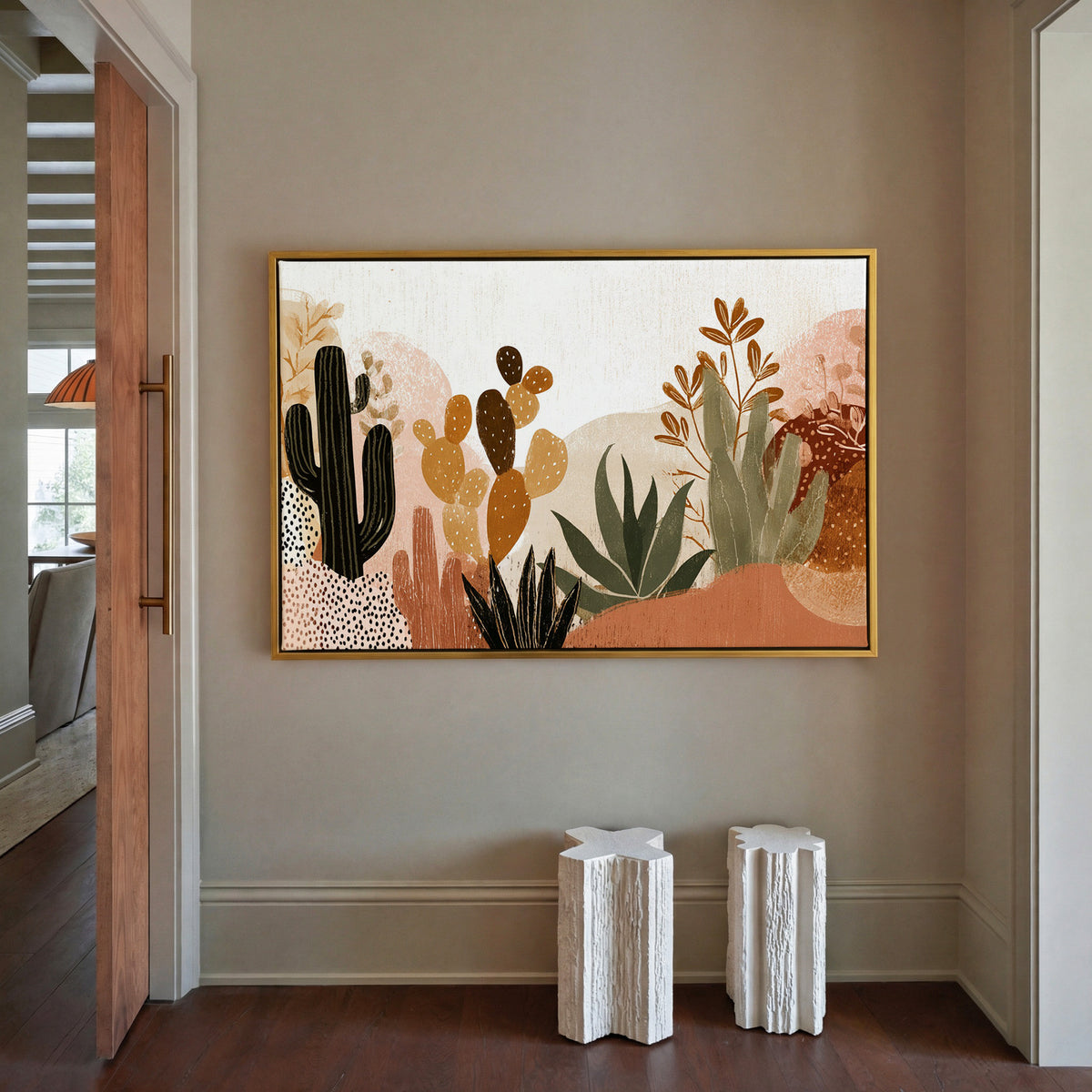 whimsical desert flora with cacti and aloe in canvas wall art in a gold frame in a styled room setting