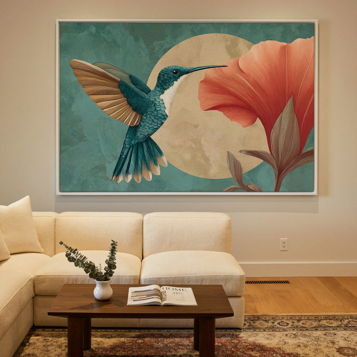 teal hummingbird beside an oversized coral canvas wall art in a white floater frame in a styled room setting