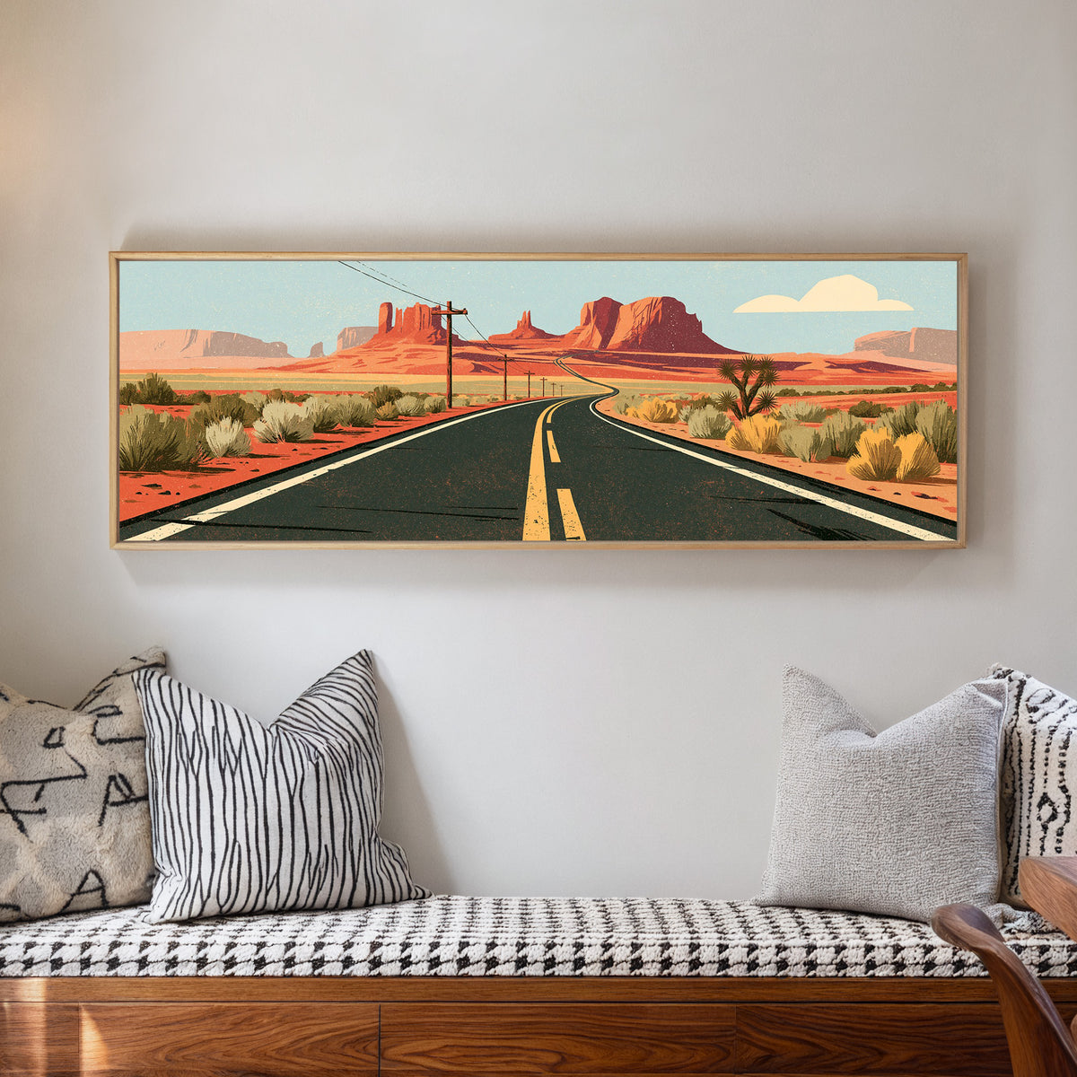 winding desert highway beneath terracotta mesas canvas wall art in a natural floater frame in a living room