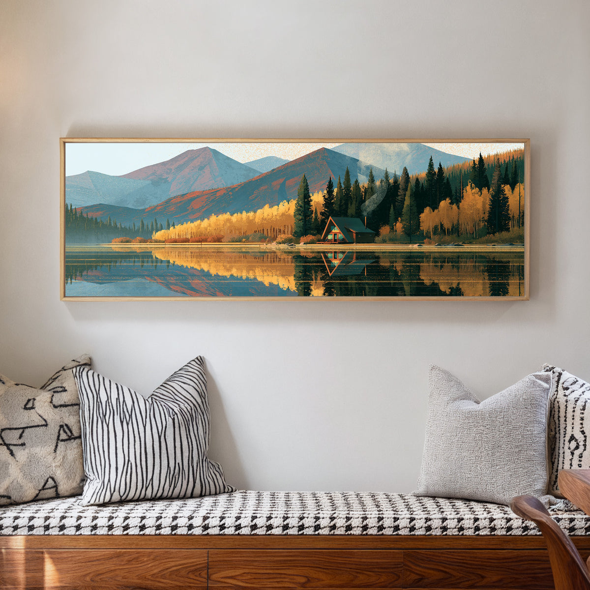 lakeside a frame cabin beneath blue mountains canvas wall art in a natural floater frame in a living room