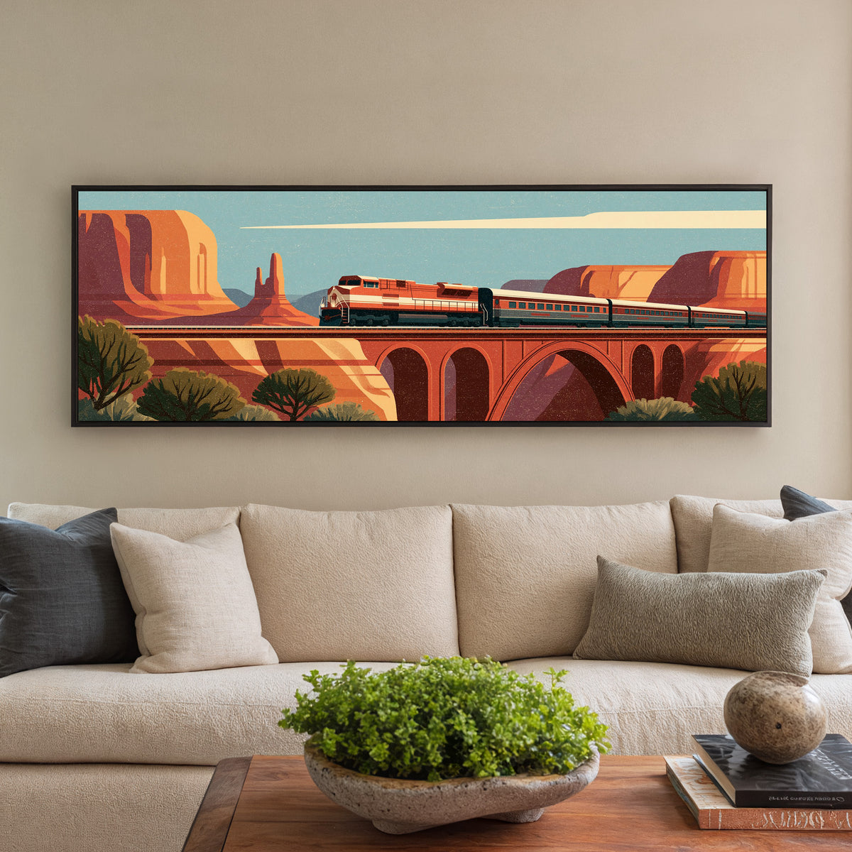 red and cream passenger train crossing an canvas wall art in a black floater frame in a styled room setting