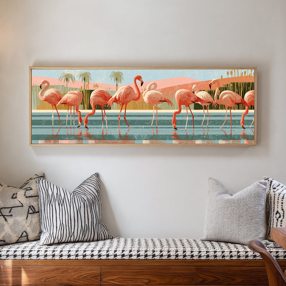 coral pink flamingos wading in striped teal canvas wall art in a natural floater frame in a living room