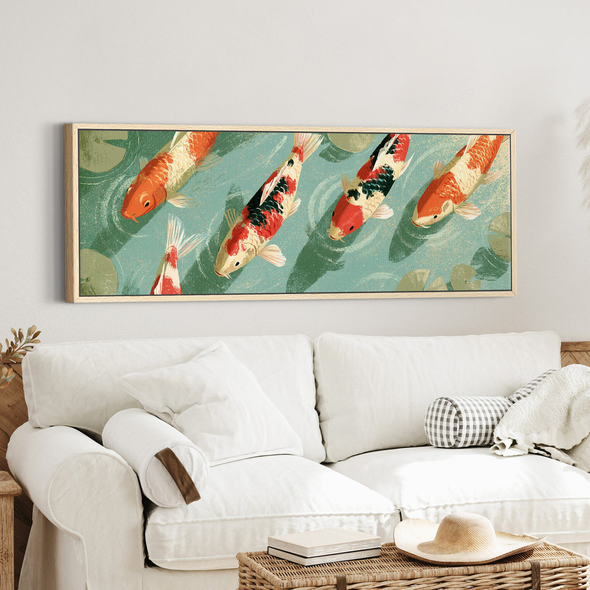 red and cream koi crossing teal canvas wall art in an oak finish floater frame in a styled room setting