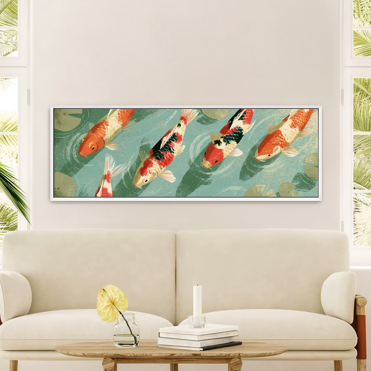 red and cream koi crossing teal water beside canvas wall art in a white floater frame in a styled room setting