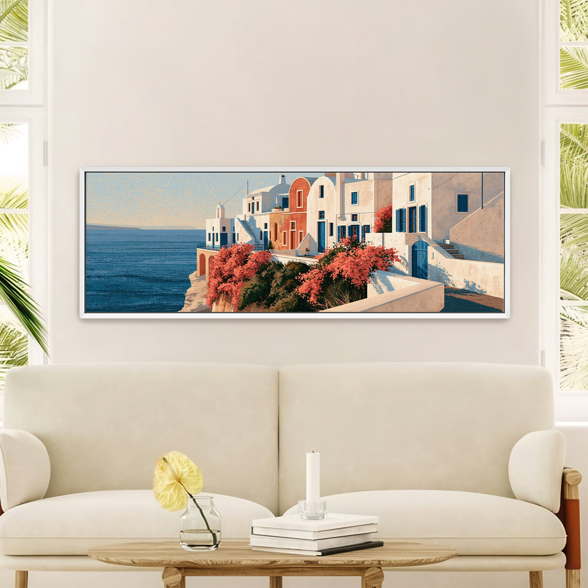 white seaside houses with blue shutters and canvas wall art in a white floater frame in a styled room setting