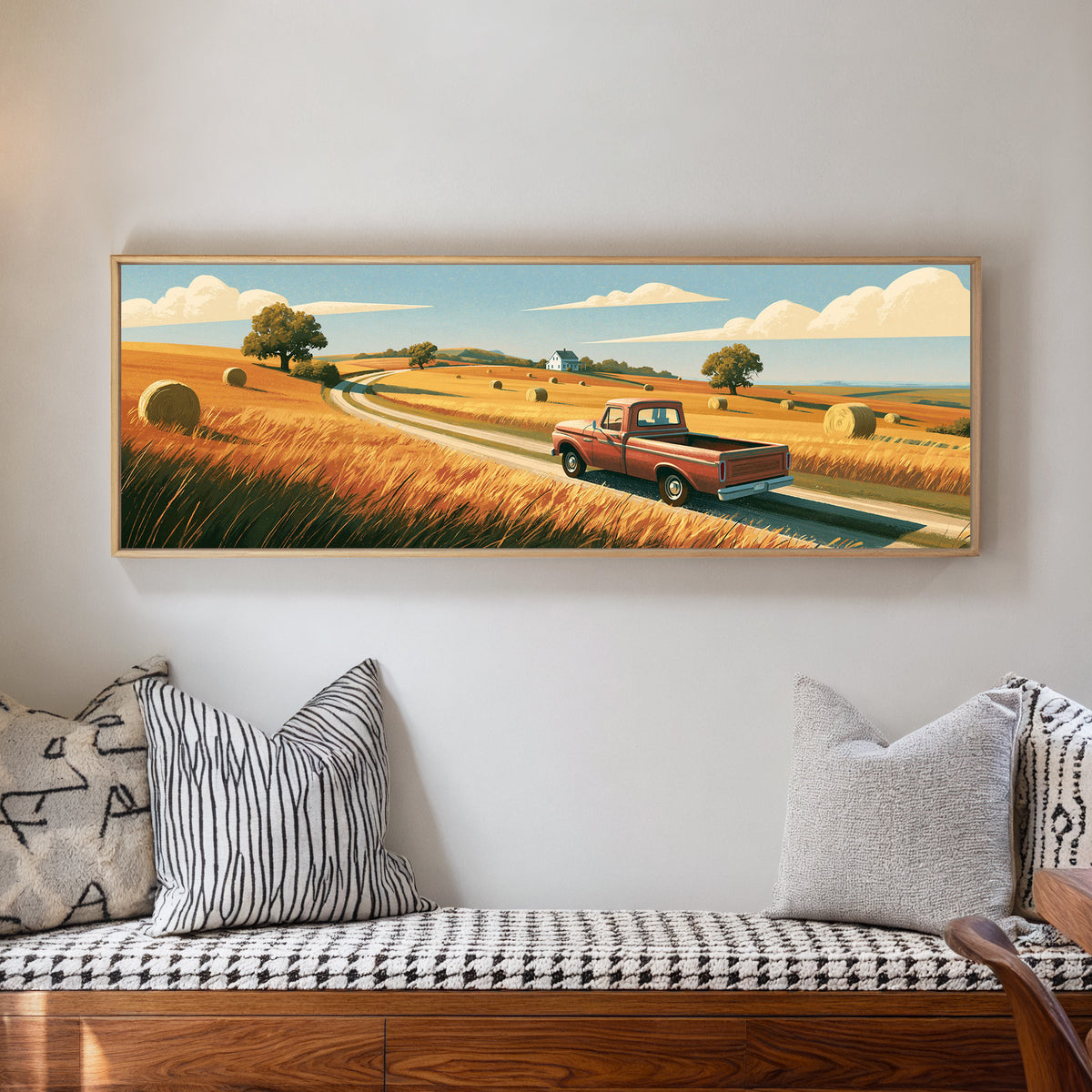red pickup on a winding road through golden canvas wall art in a natural floater frame in a living room