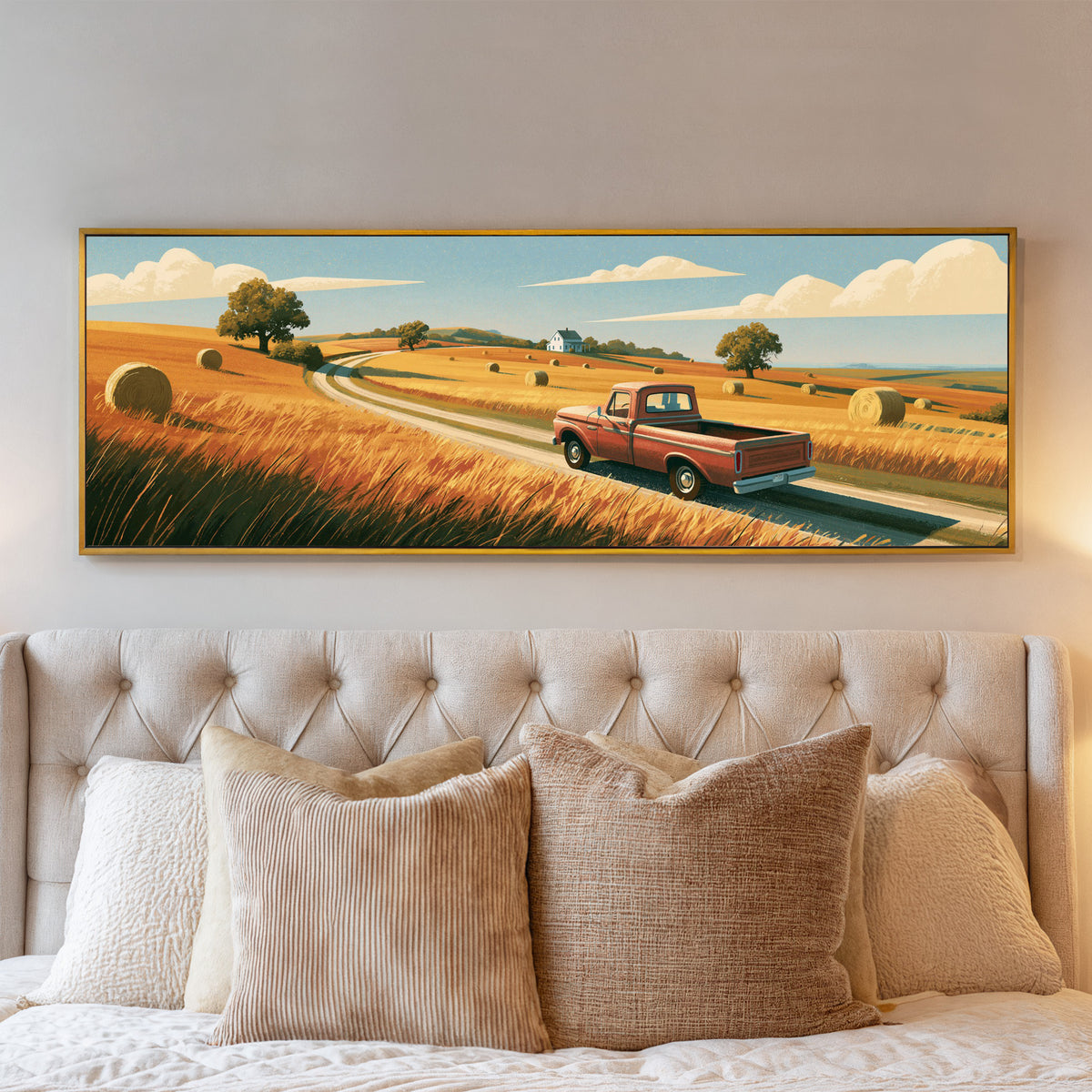 red pickup on a winding road through golden canvas wall art in a gold floater frame above a bed