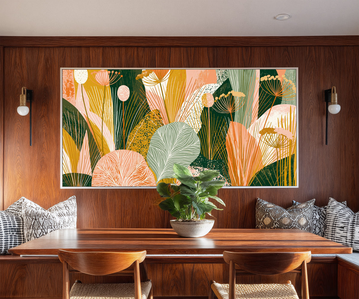 coral and green leaves with fine canvas wall art in a white floater frame in a styled room setting
