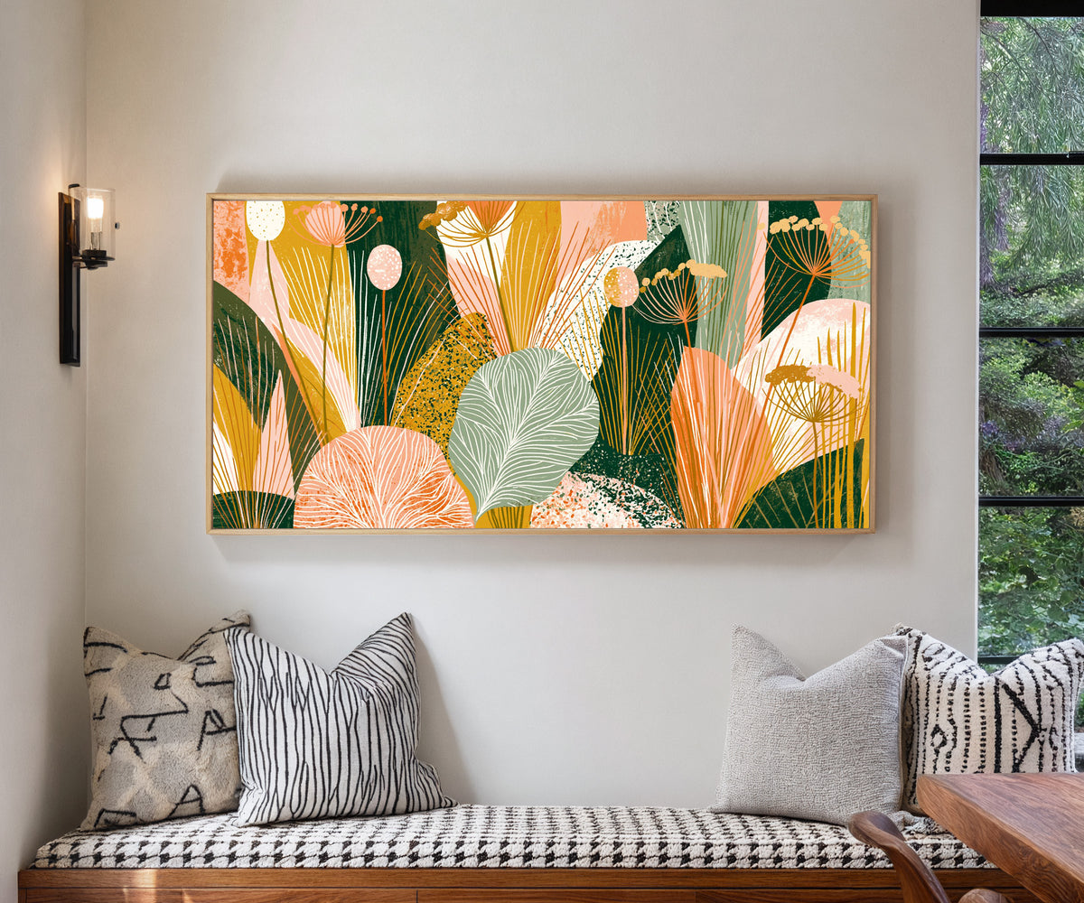 coral and green leaves with fine veins and fan canvas wall art in a natural floater frame in a living room